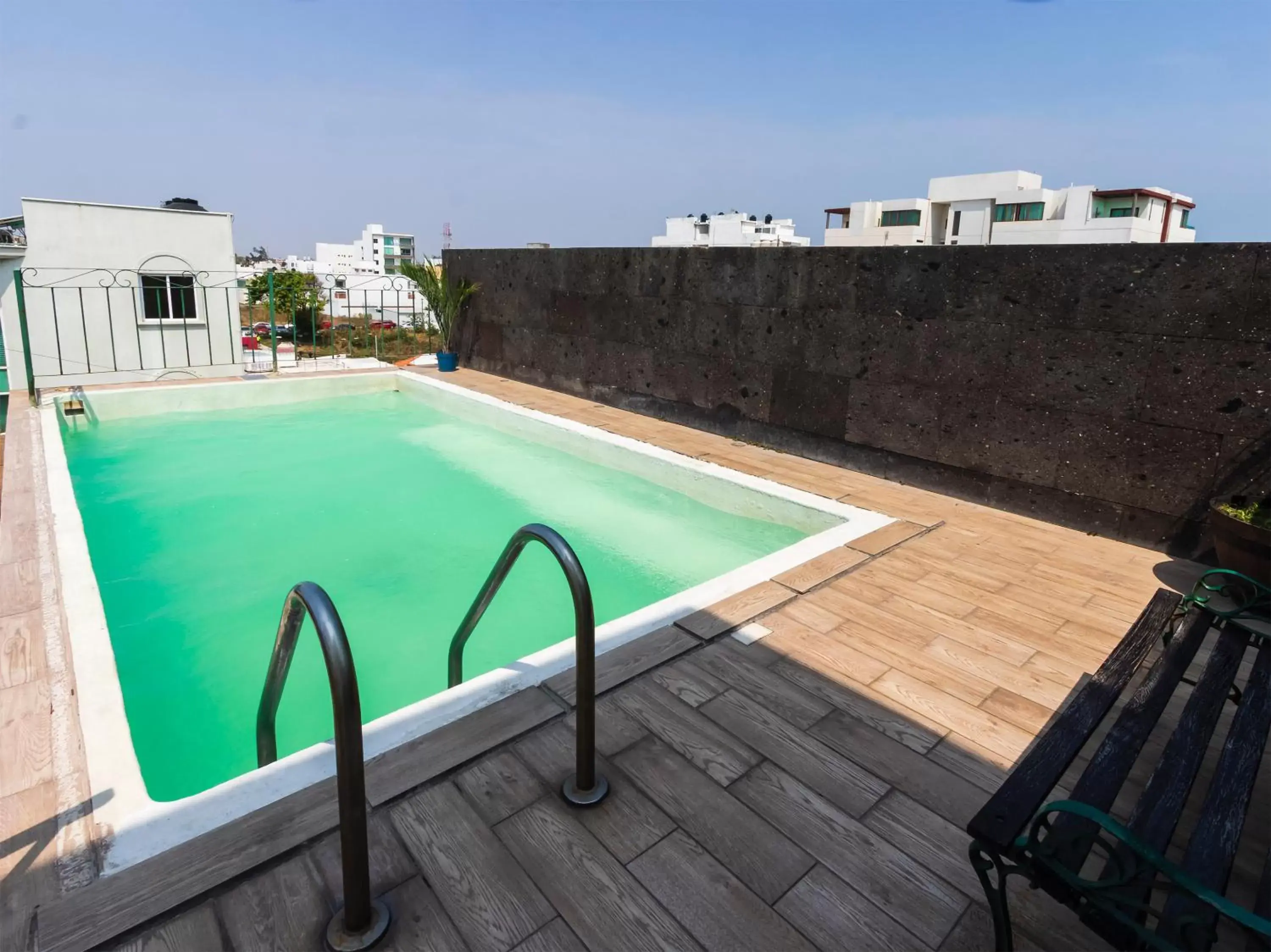 Balcony/Terrace, Swimming Pool in Boca Inn Hotel & Suites