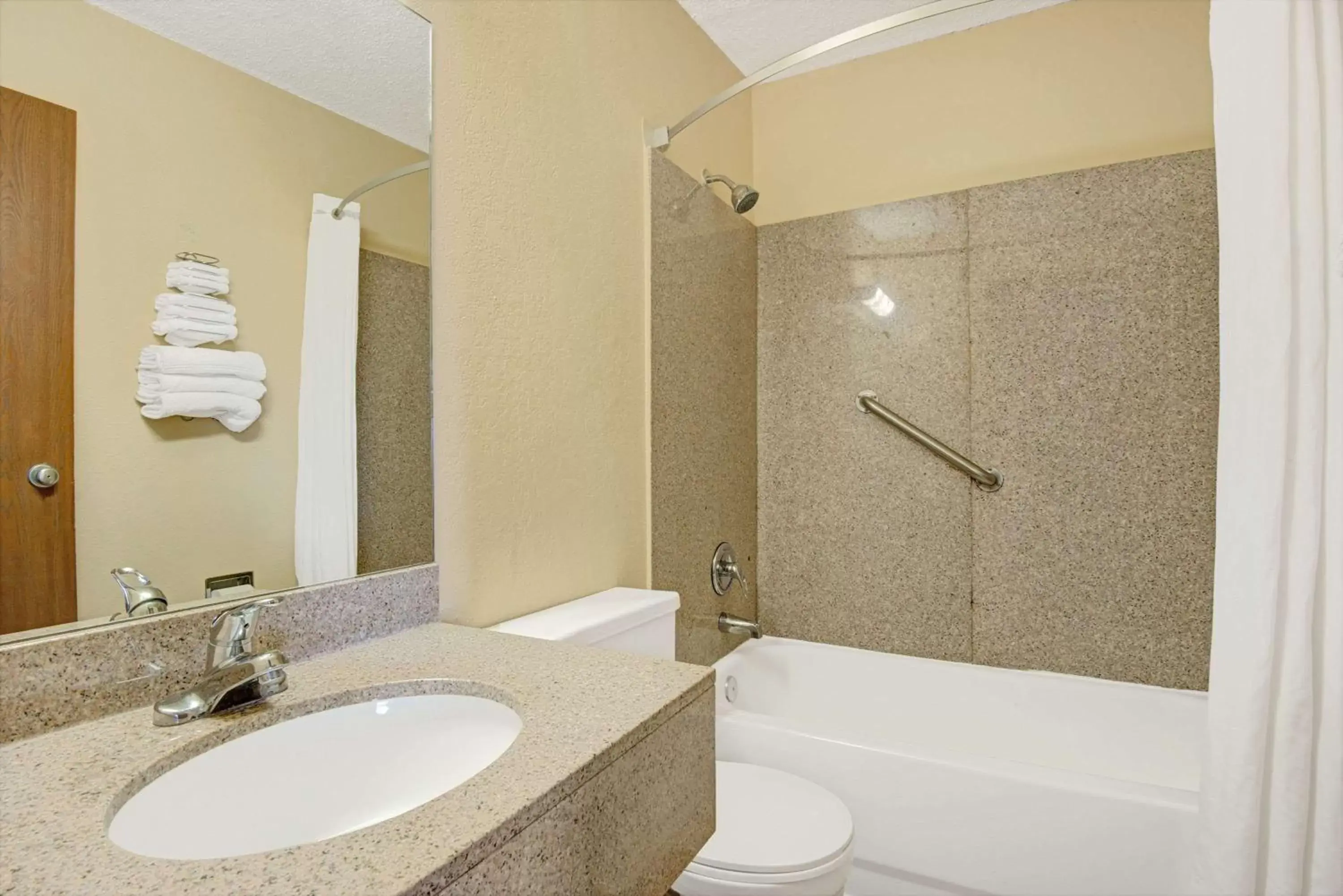 Bathroom in Super 8 by Wyndham Independence Kansas City