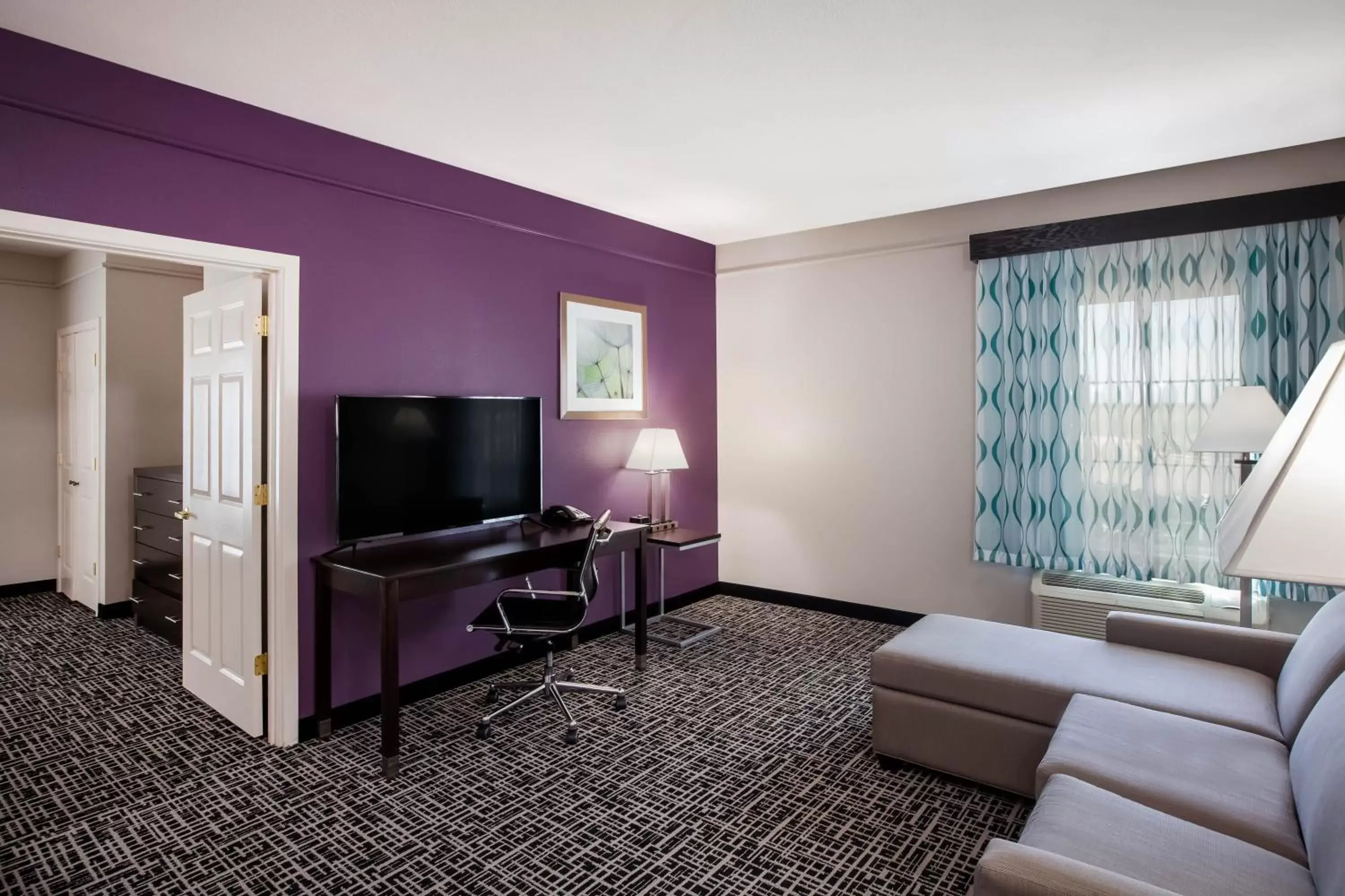 TV and multimedia, TV/Entertainment Center in La Quinta by Wyndham Lubbock North