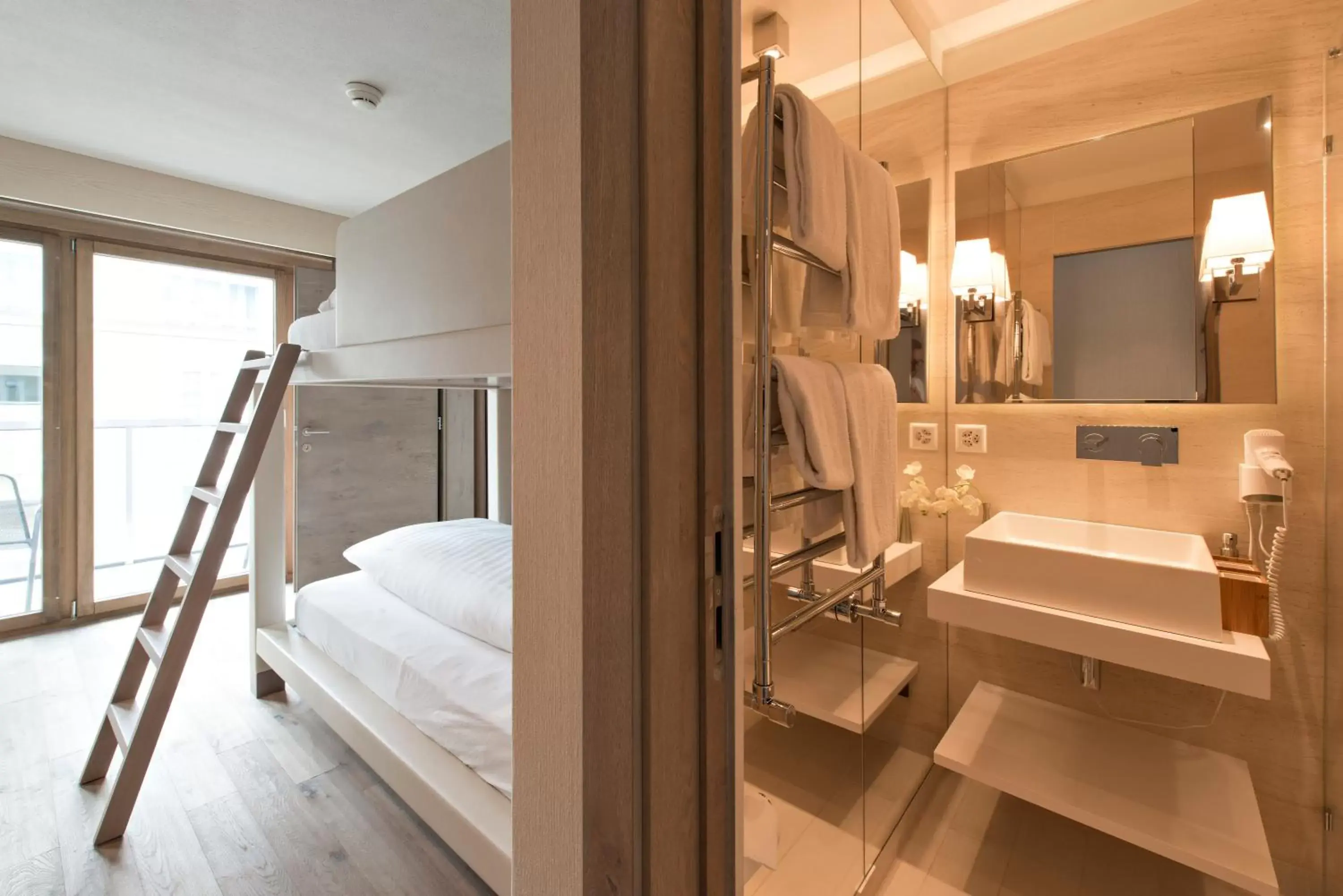 Bed, Bathroom in Hotel Piz St. Moritz