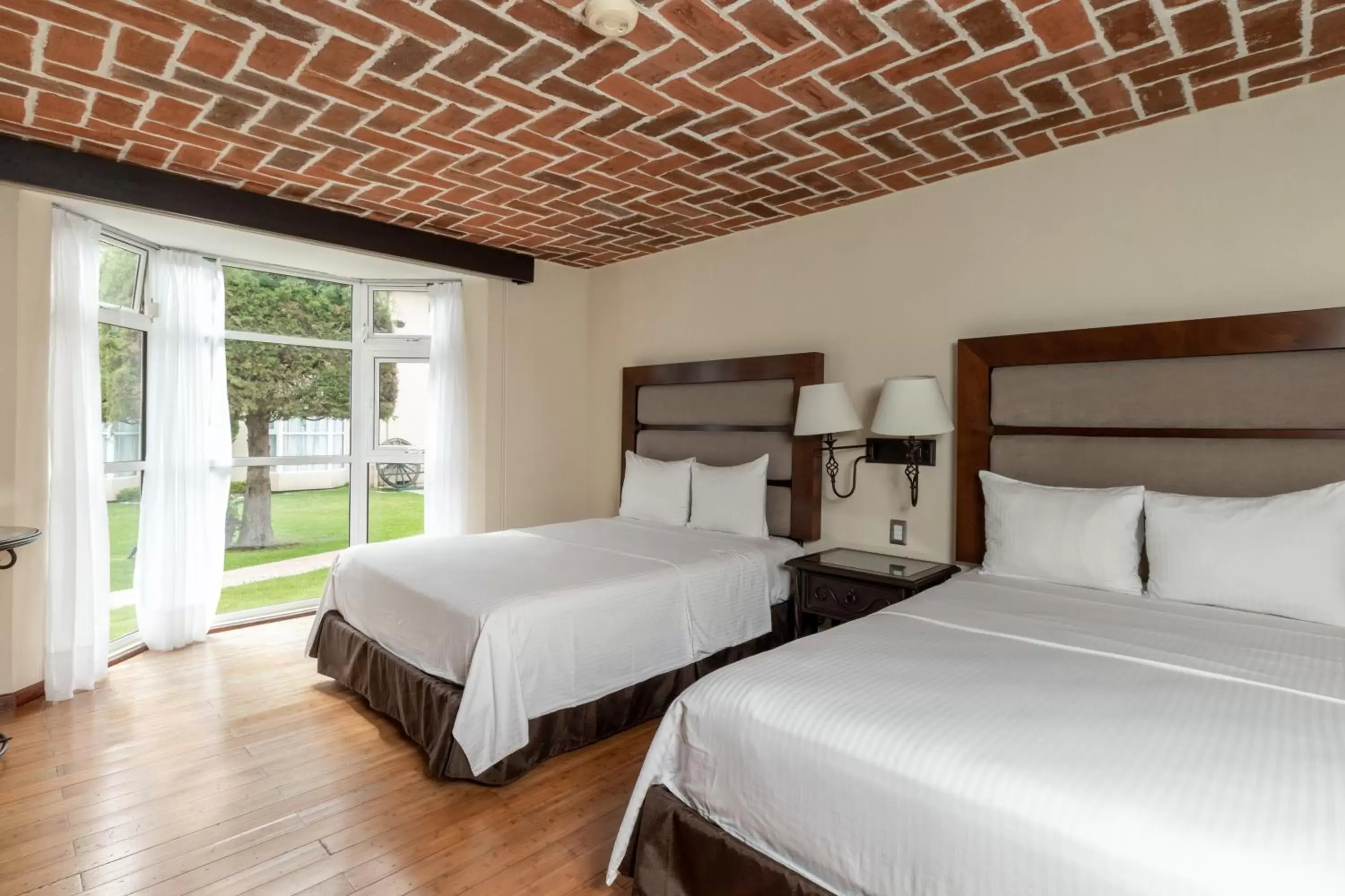 Photo of the whole room, Bed in Hoteles Villa Mercedes San Cristobal