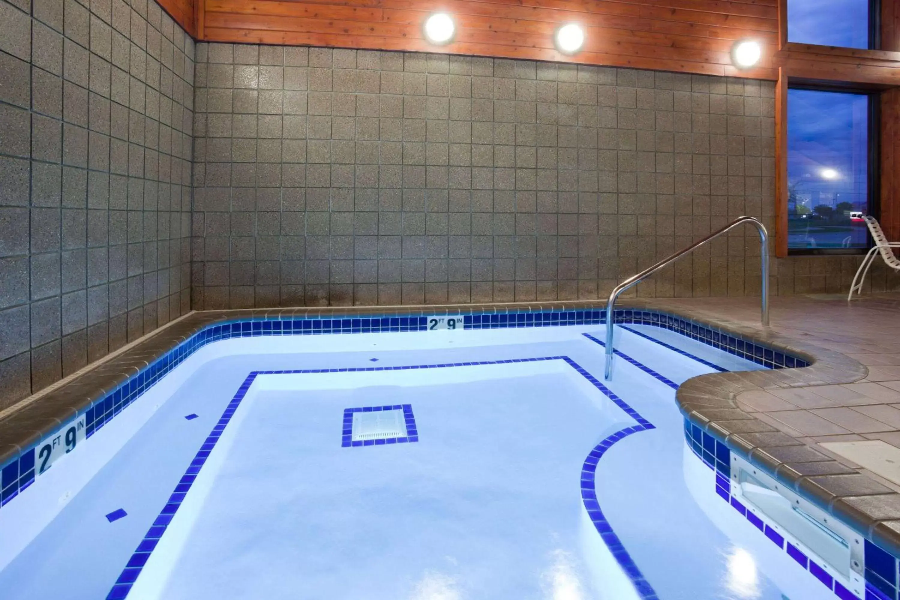 Hot Tub, Swimming Pool in AmericInn by Wyndham Sartell