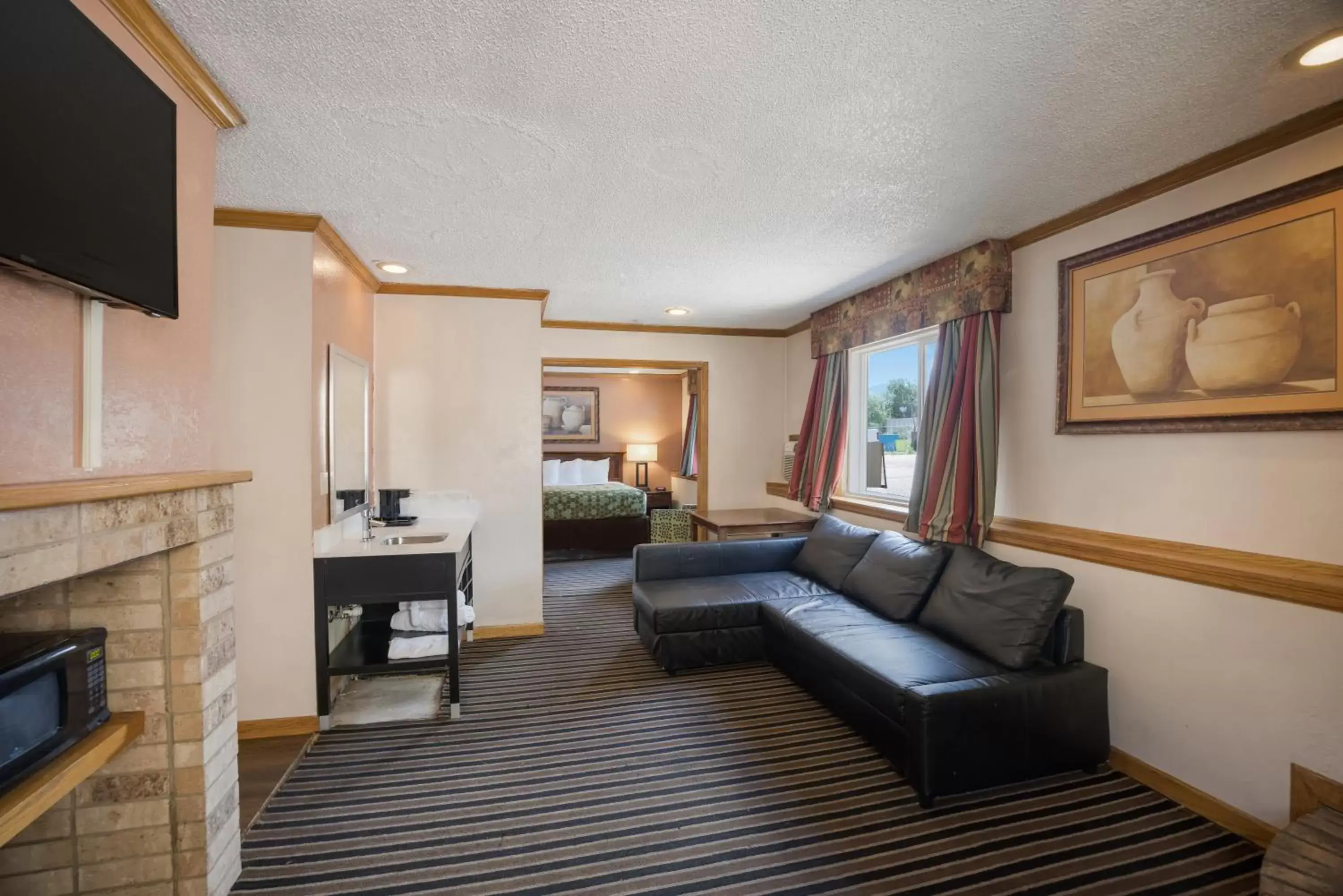 Living room, Seating Area in Rodeway Inn