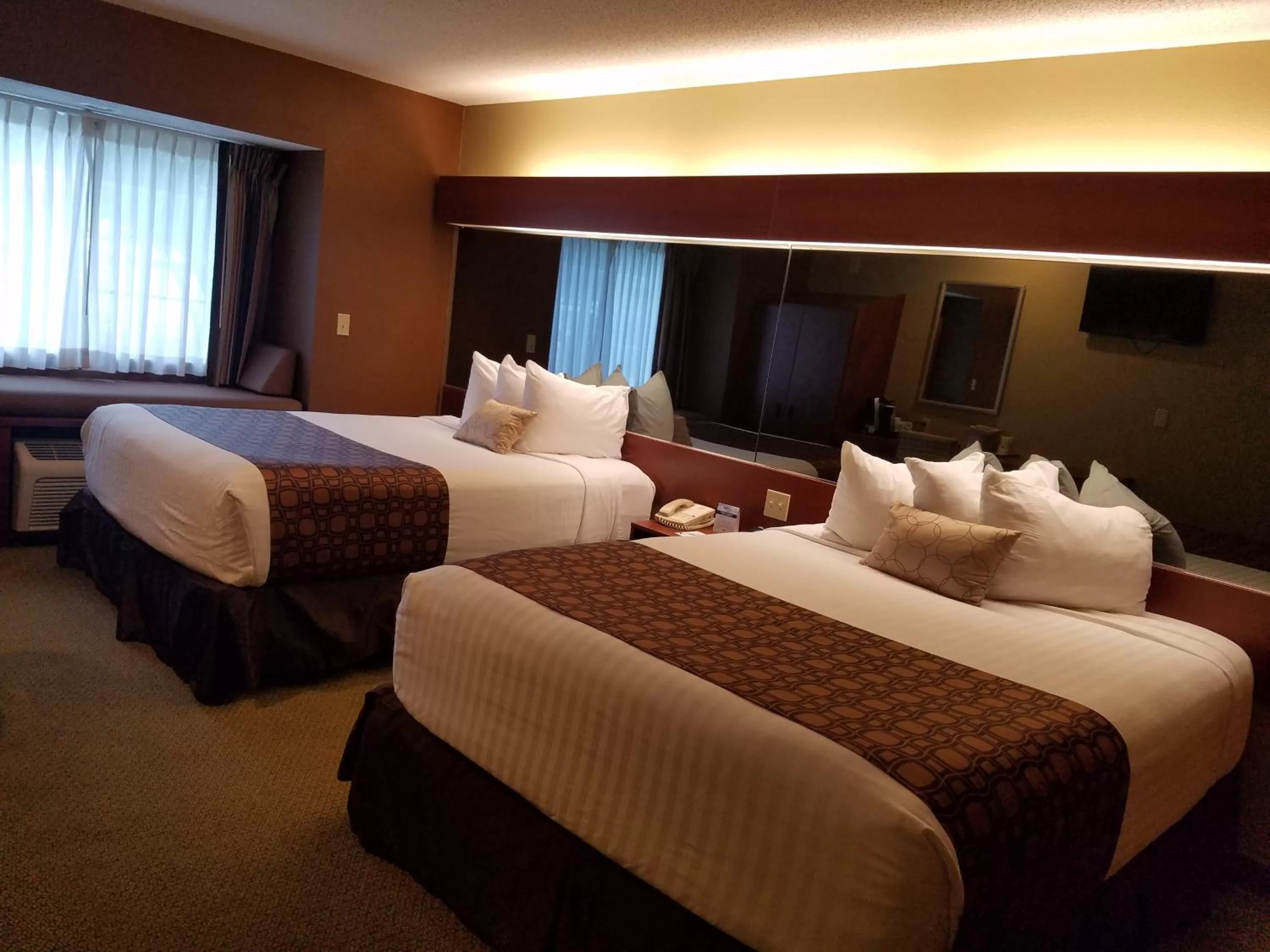 Bed in Microtel Inn & Suites by Wyndham Dover New Hampshire