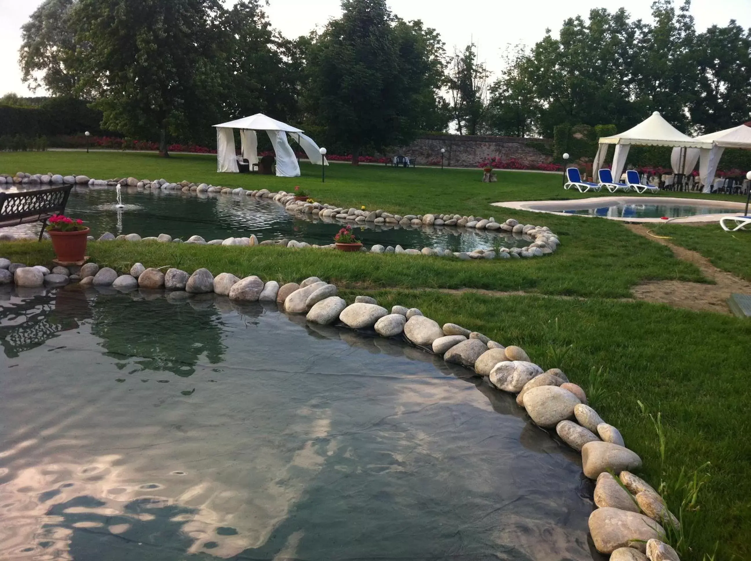 Patio, Swimming Pool in Motel Cosmera