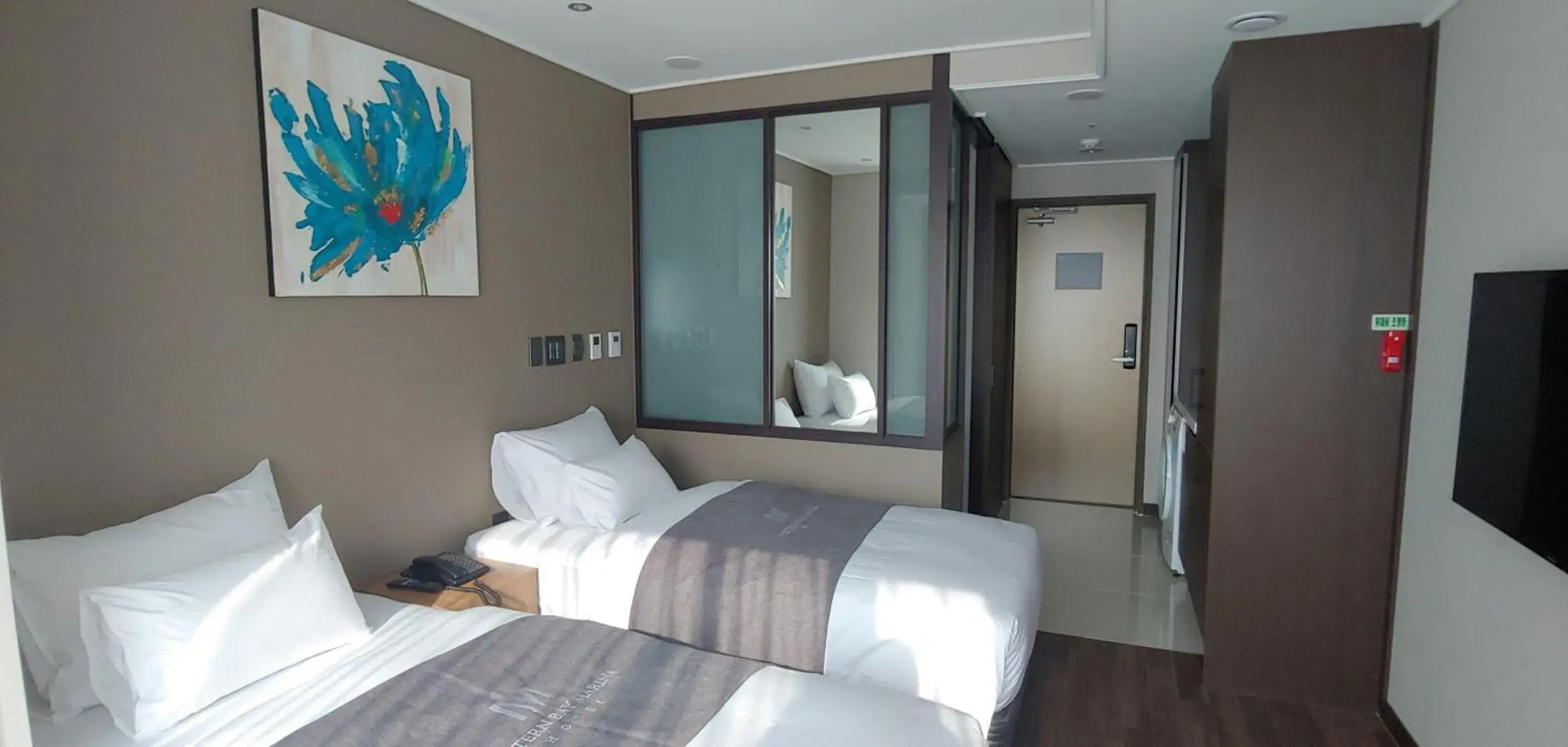 Bed in Westernbay Marina Hotel