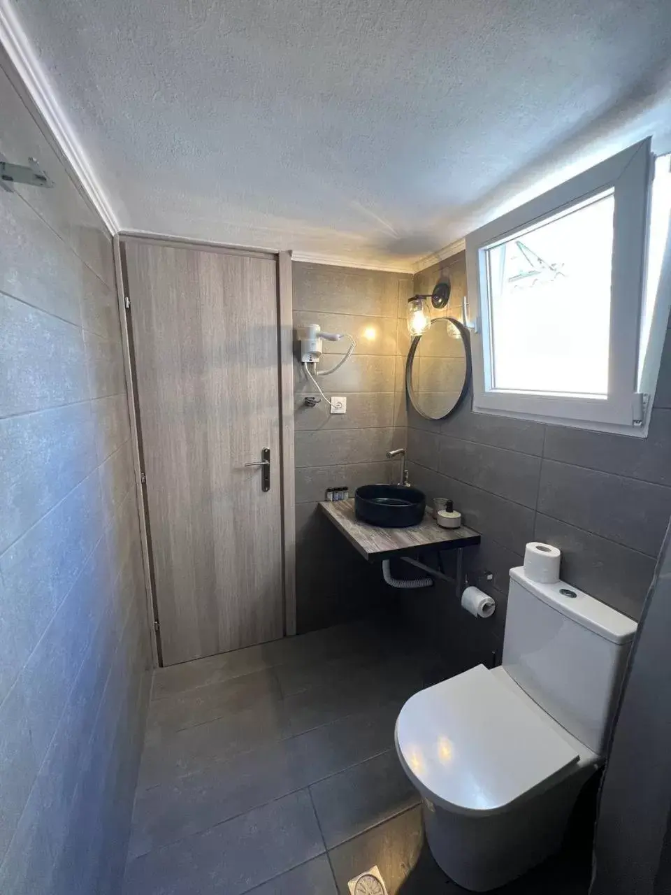 Toilet, Bathroom in Elefsinian Mysteries Apartments