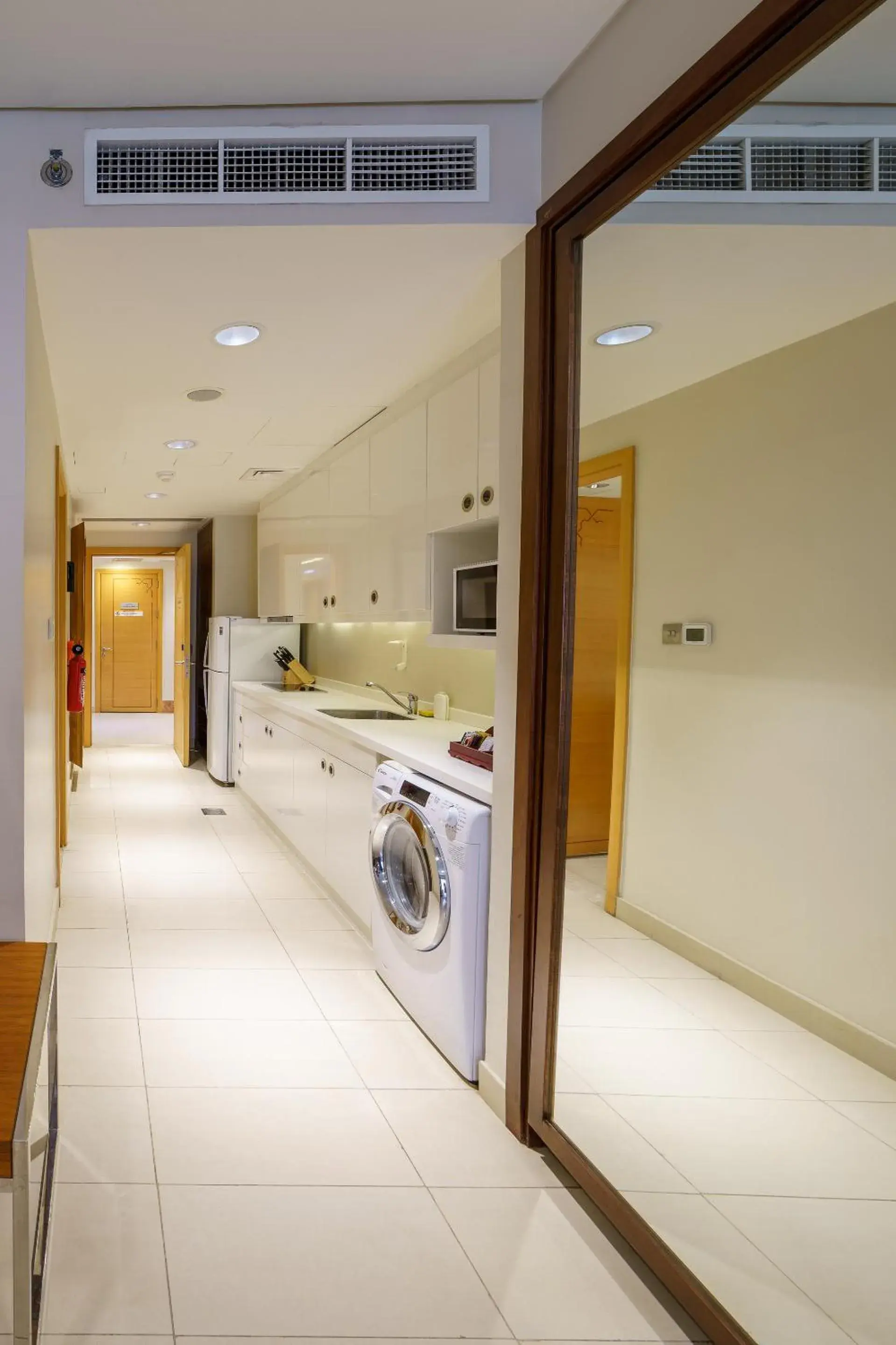 Kitchen or kitchenette in Levatio Suites Muscat, a member of Radisson Individuals