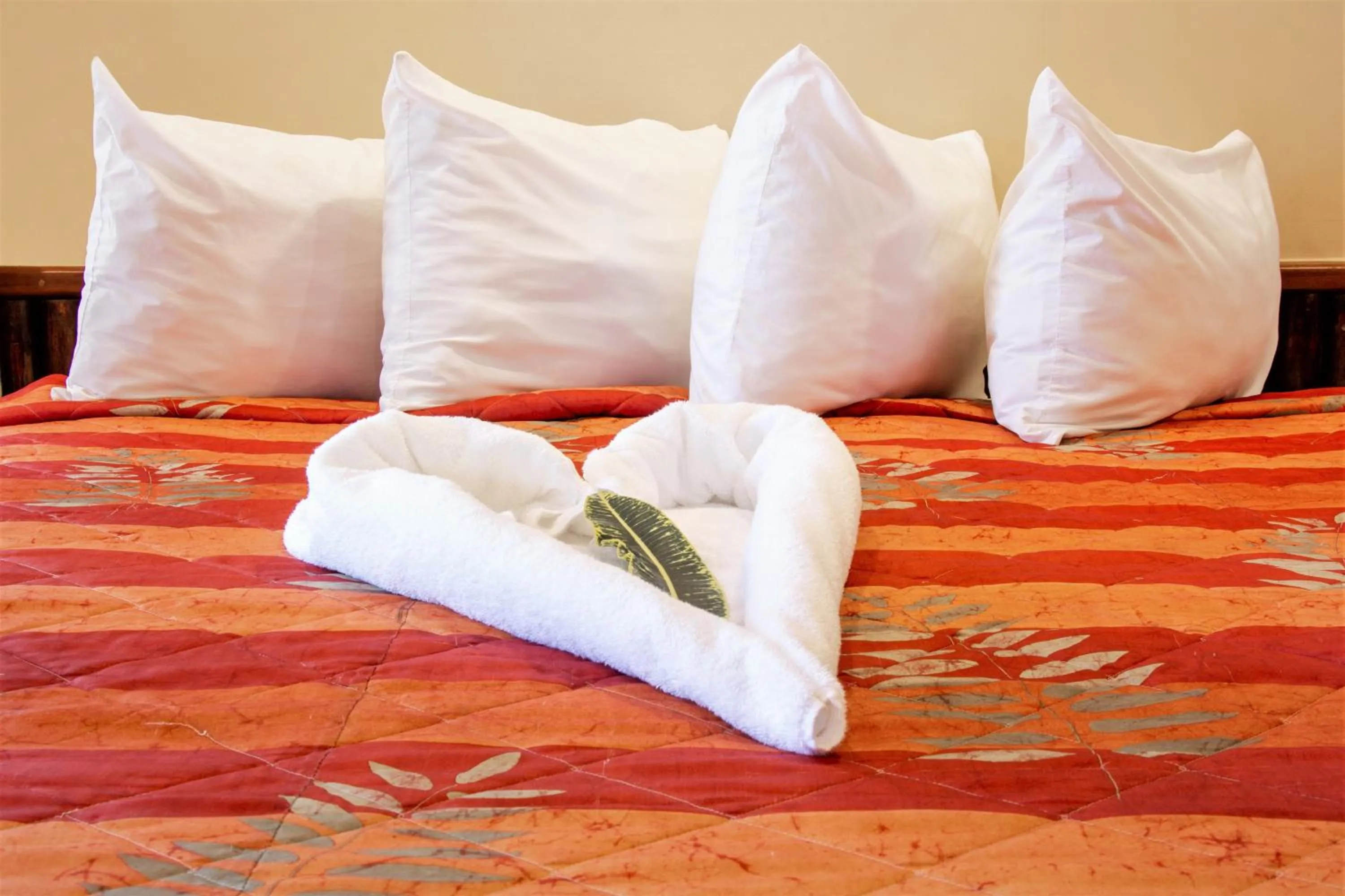 Bed in Ramon's Village Resort