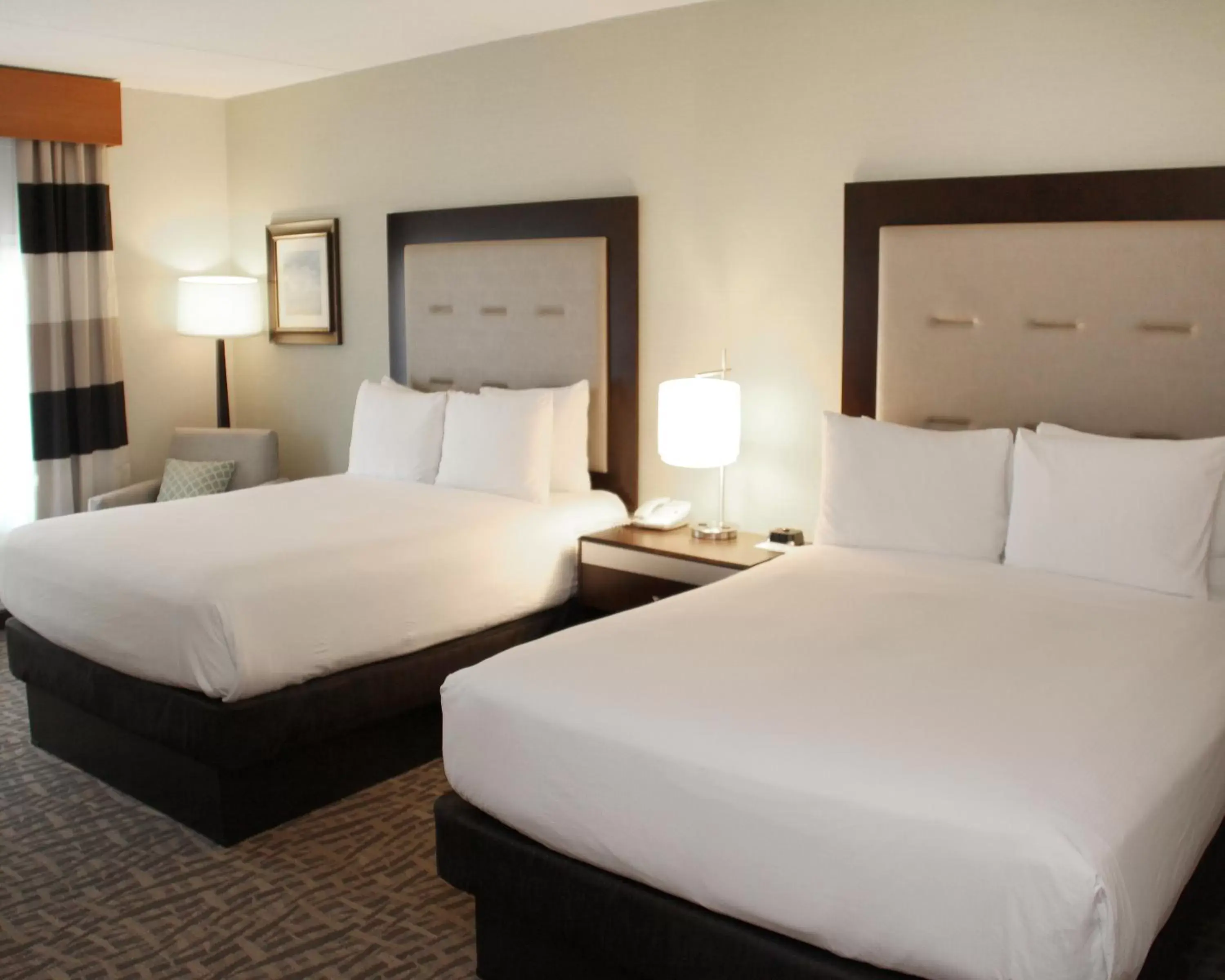 Bedroom, Bed in Wyndham Garden Buffalo Downtown