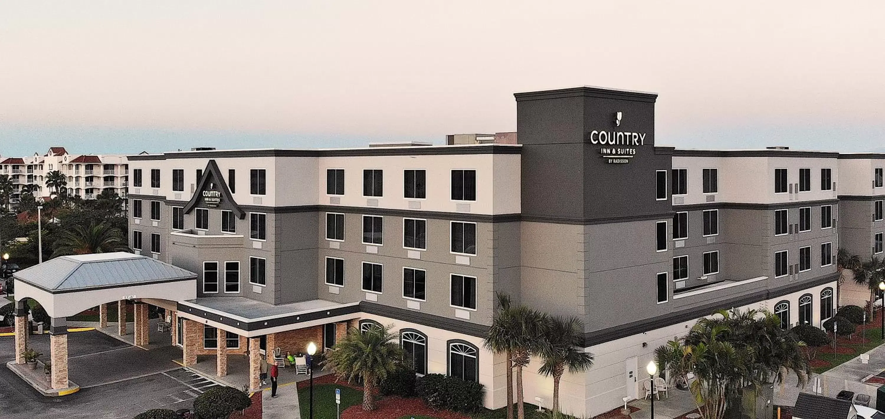 Property Building in Country Inn & Suites by Radisson, Port Canaveral, FL