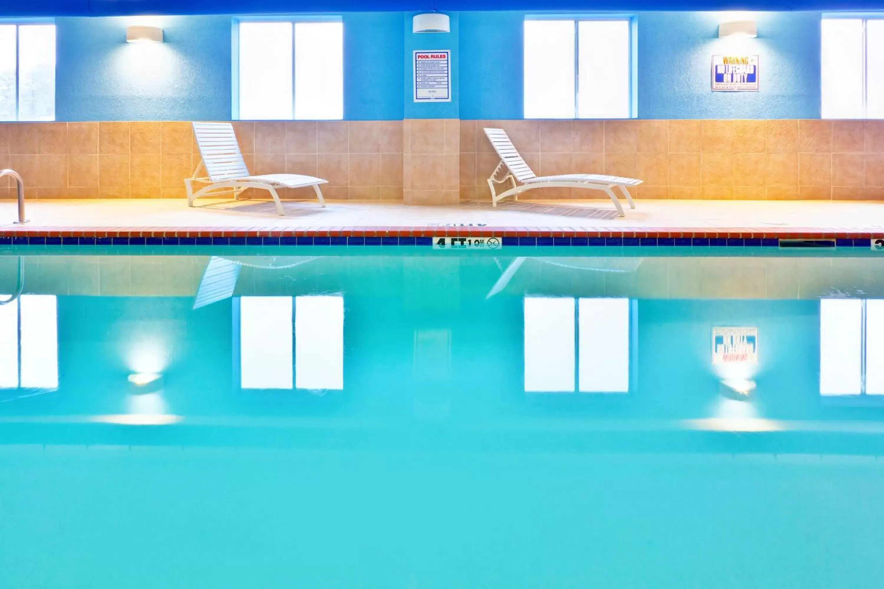 Swimming pool in Holiday Inn Express Hotel & Suites Byram, an IHG Hotel