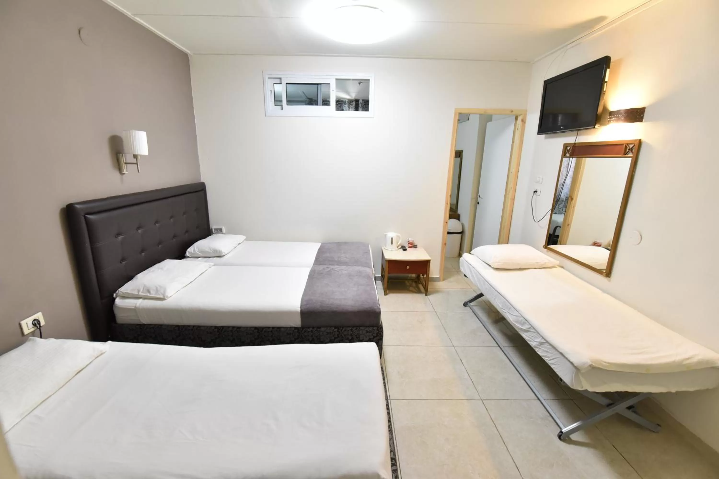 Photo of the whole room, Bed in Hotel Maman