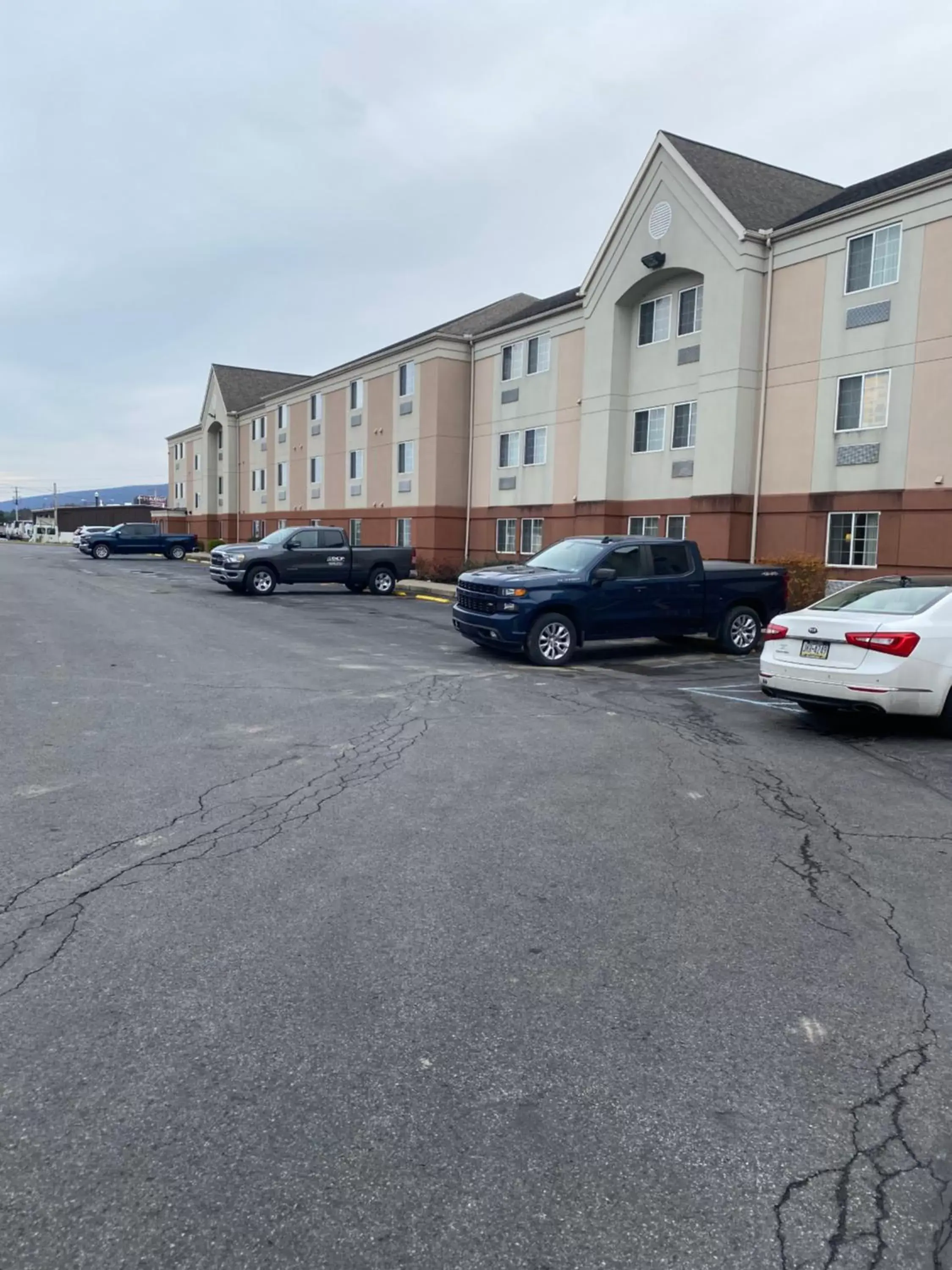 Parking, Property Building in Candlewood Williamsport, an IHG Hotel