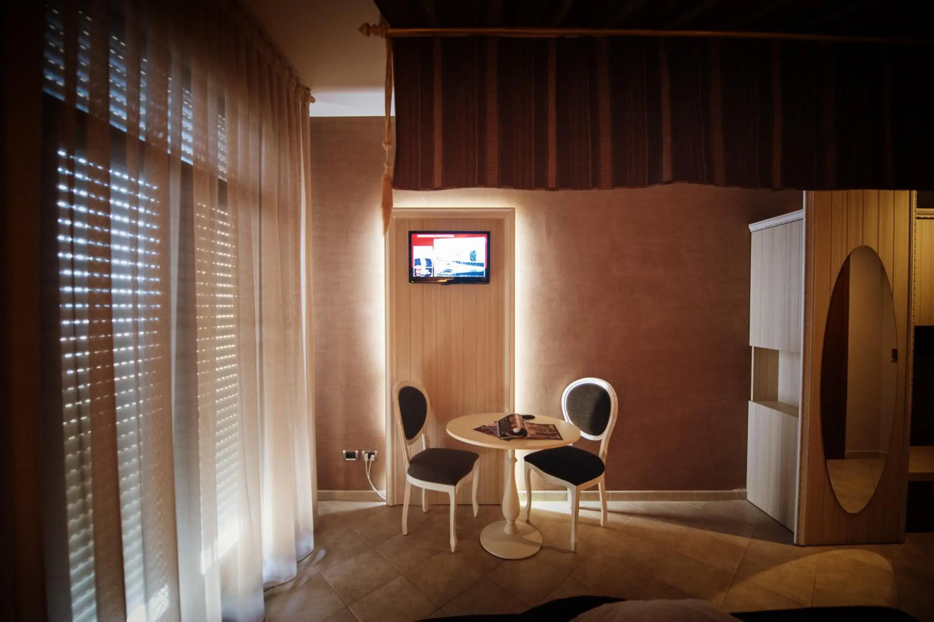 TV and multimedia, Seating Area in Gran Paradiso Hotel Spa