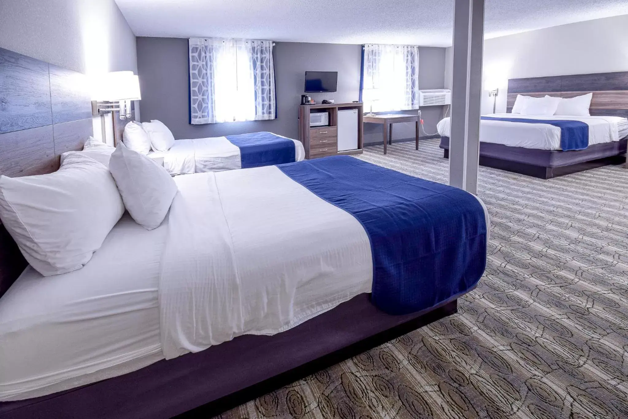 Photo of the whole room, Bed in Days Inn & Suites by Wyndham Wisconsin Dells