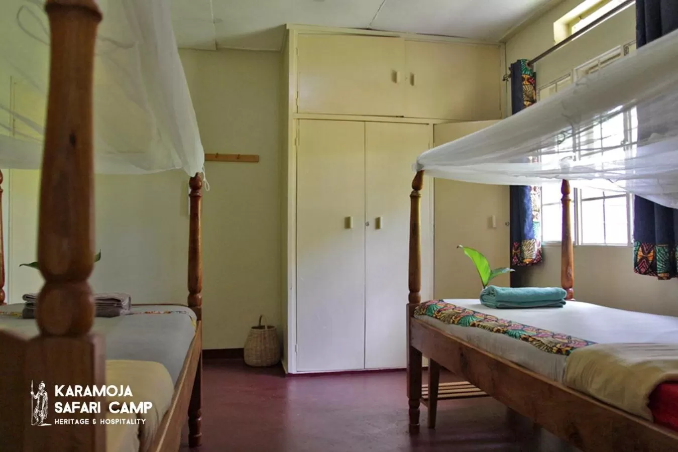 Bed in Kara-Tunga Safari Camp