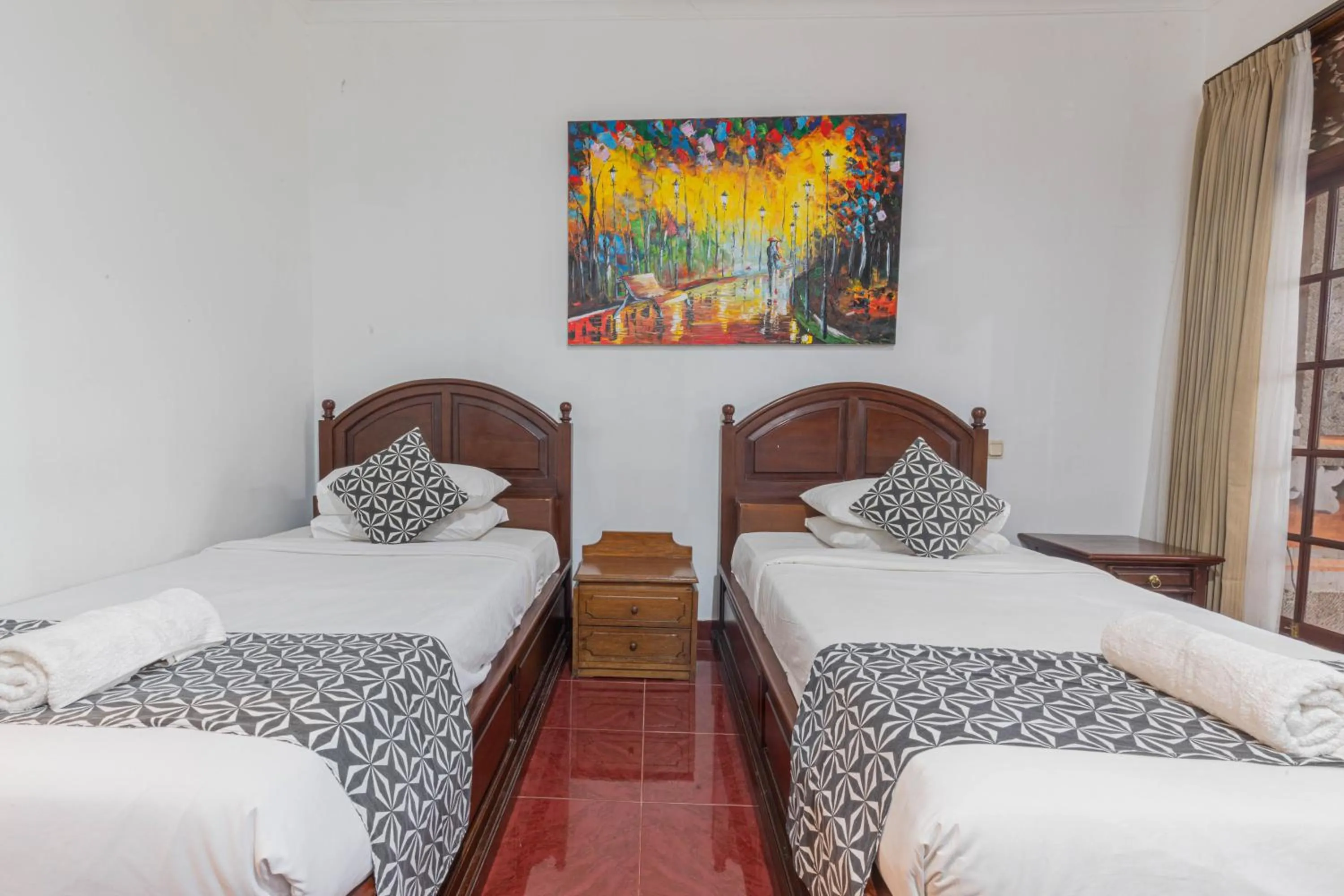 Bedroom in Puri Mango Guest House Sanur