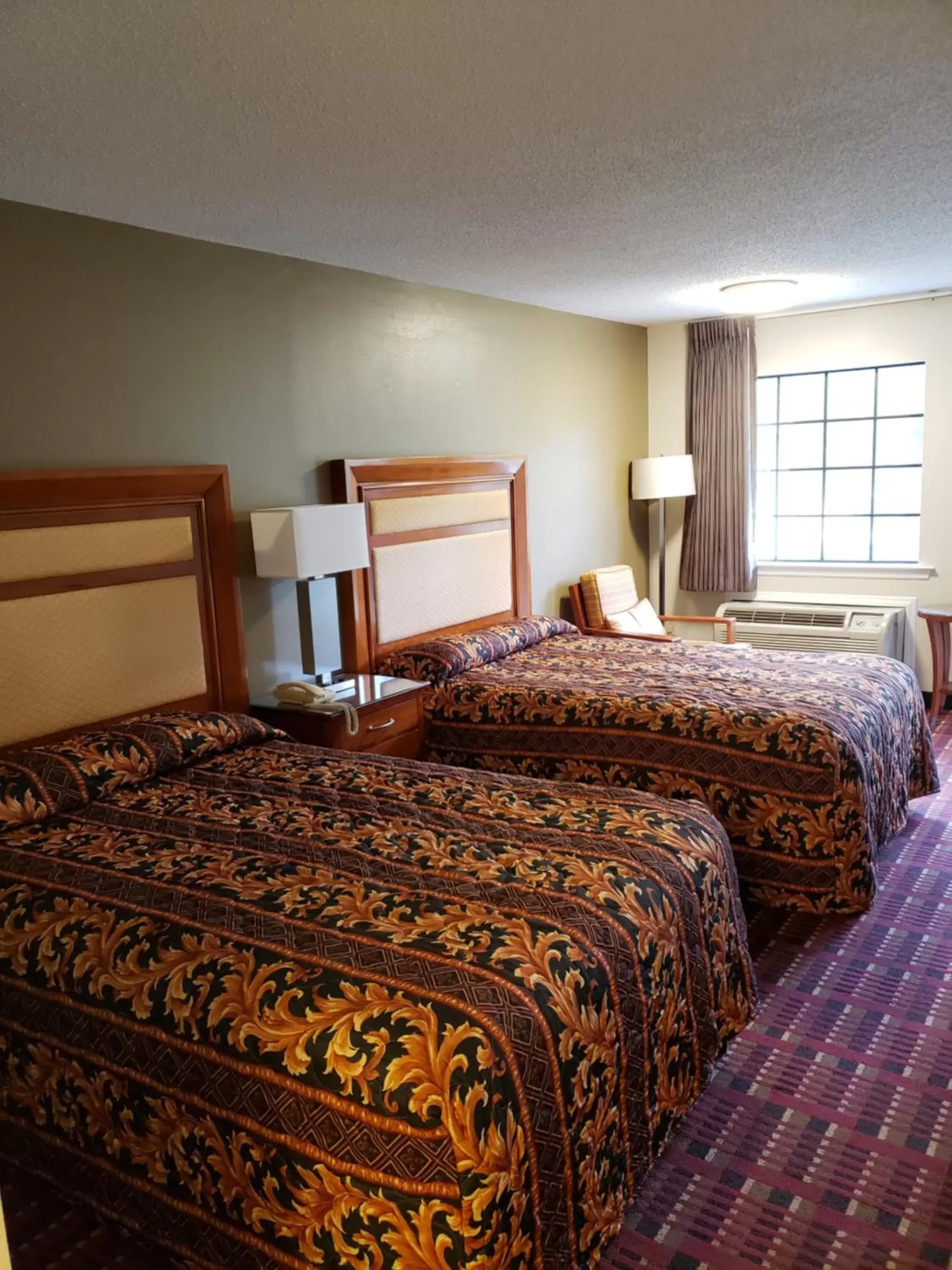 Bed in Peach Tree Inn Bed in Peach Tree Inn