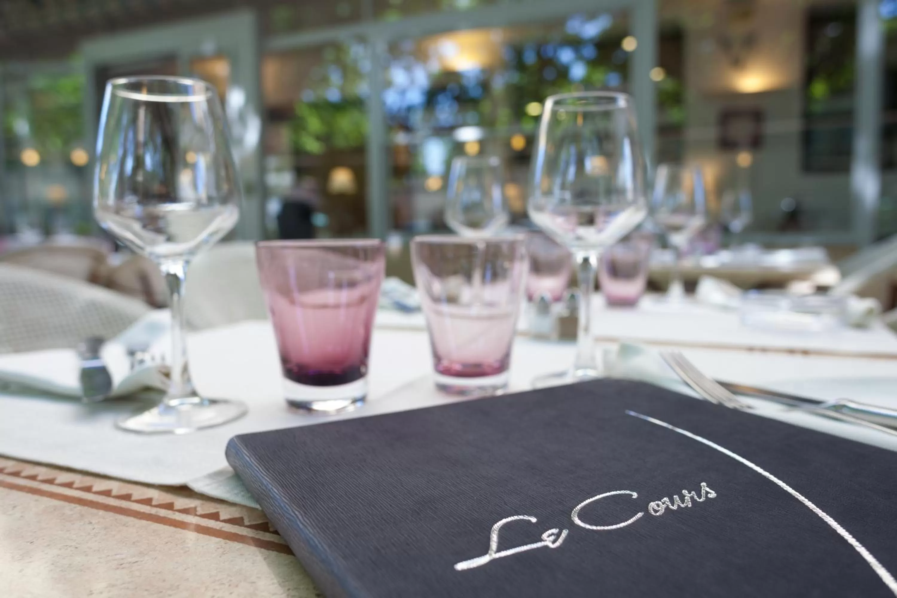Patio in Logis Hôtel Restaurant Le Cours