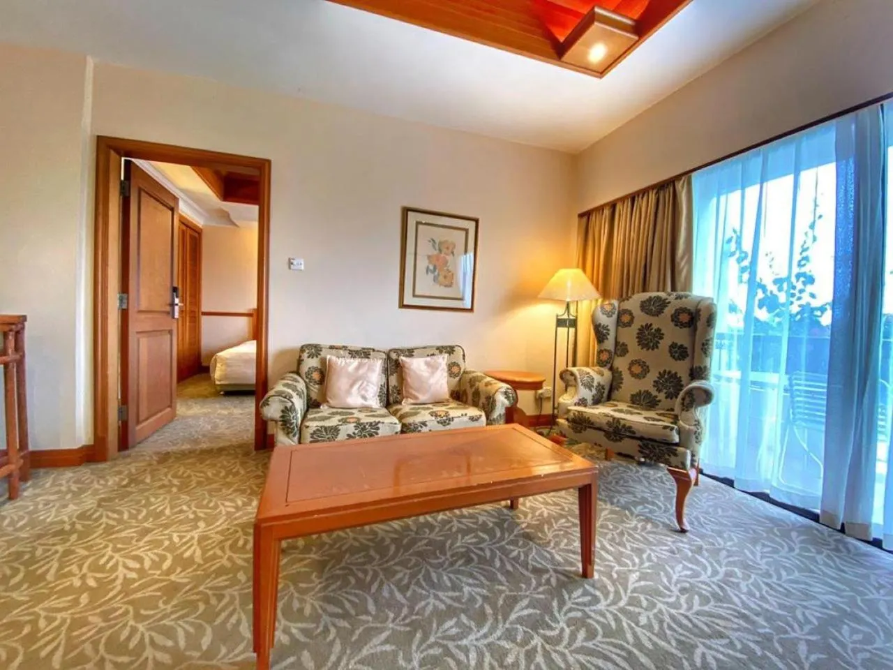 Living room, Bed in Tiara Labuan Hotel