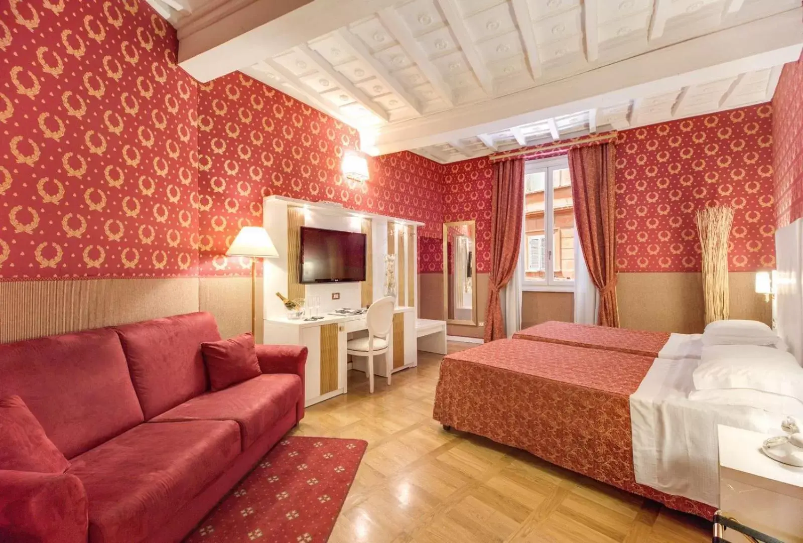 Bedroom in Relais Fontana Di Trevi Hotel