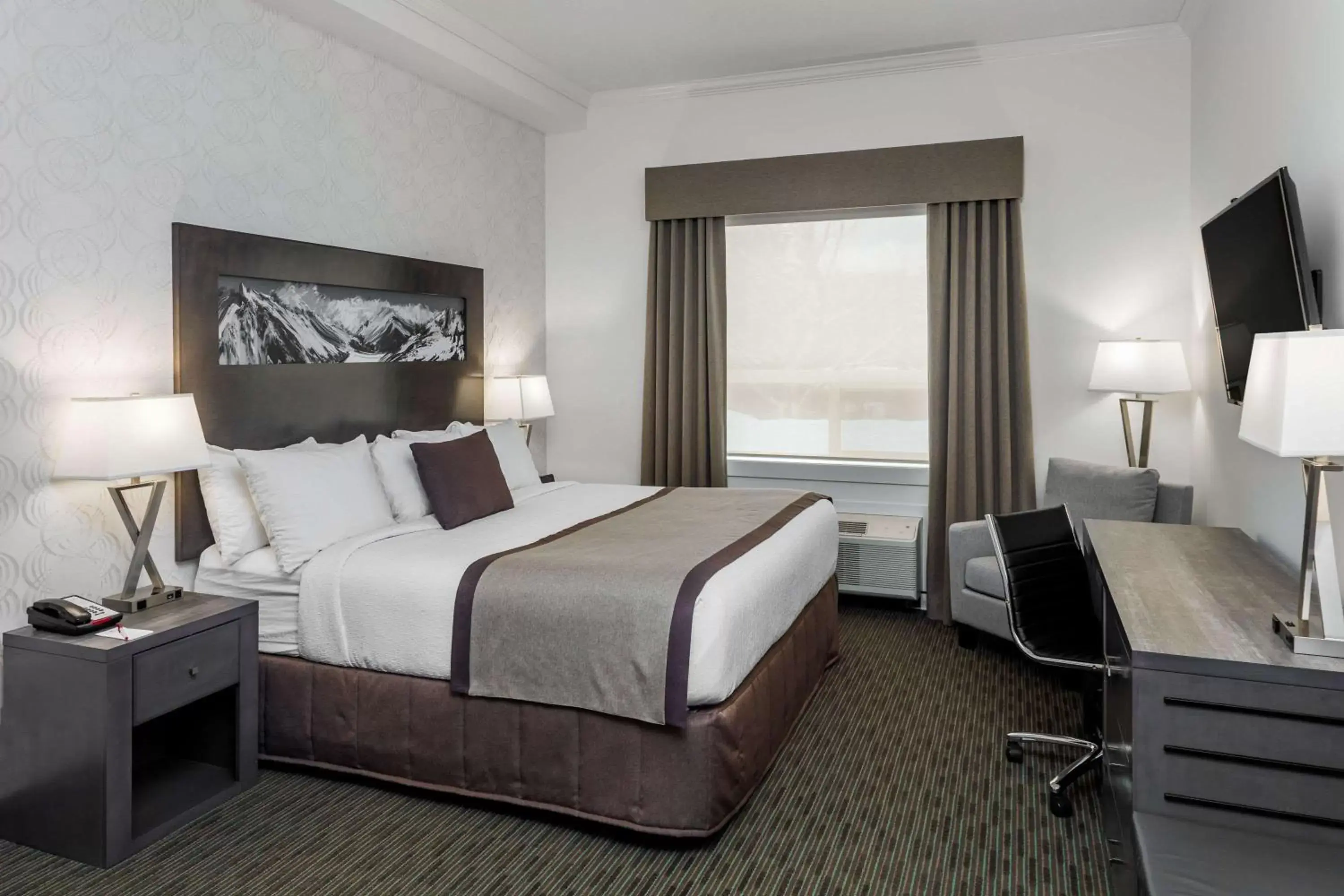 Photo of the whole room, Bed in Ramada by Wyndham Revelstoke