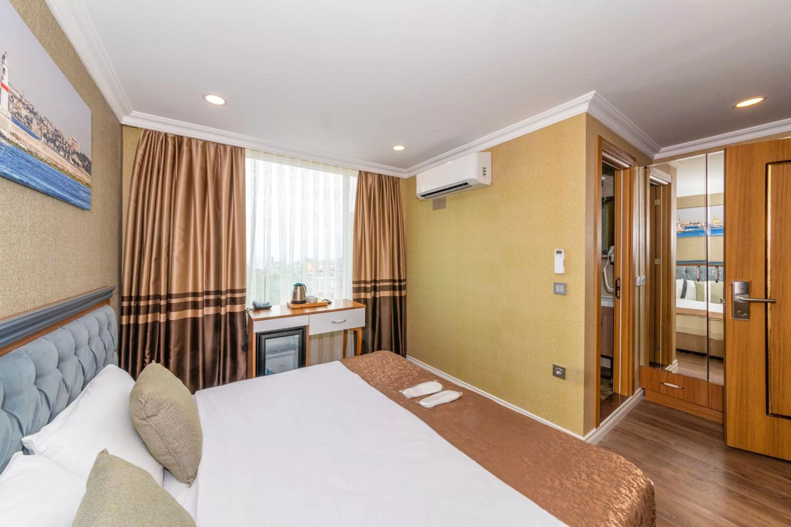 Bed in Golden Sand Hotel