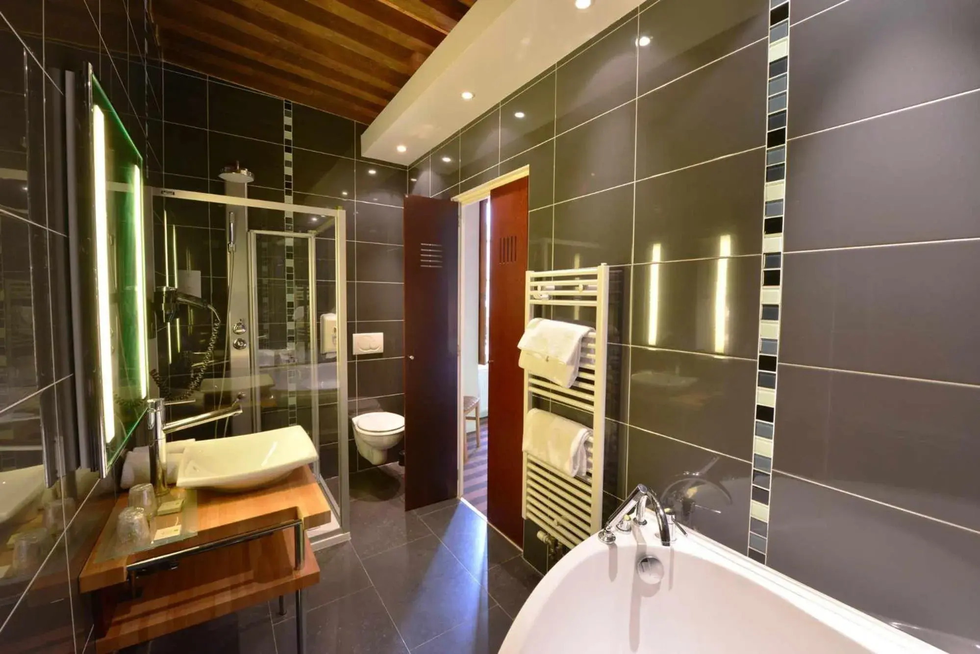 Bathroom in Logis Hotel De La Cote D'or