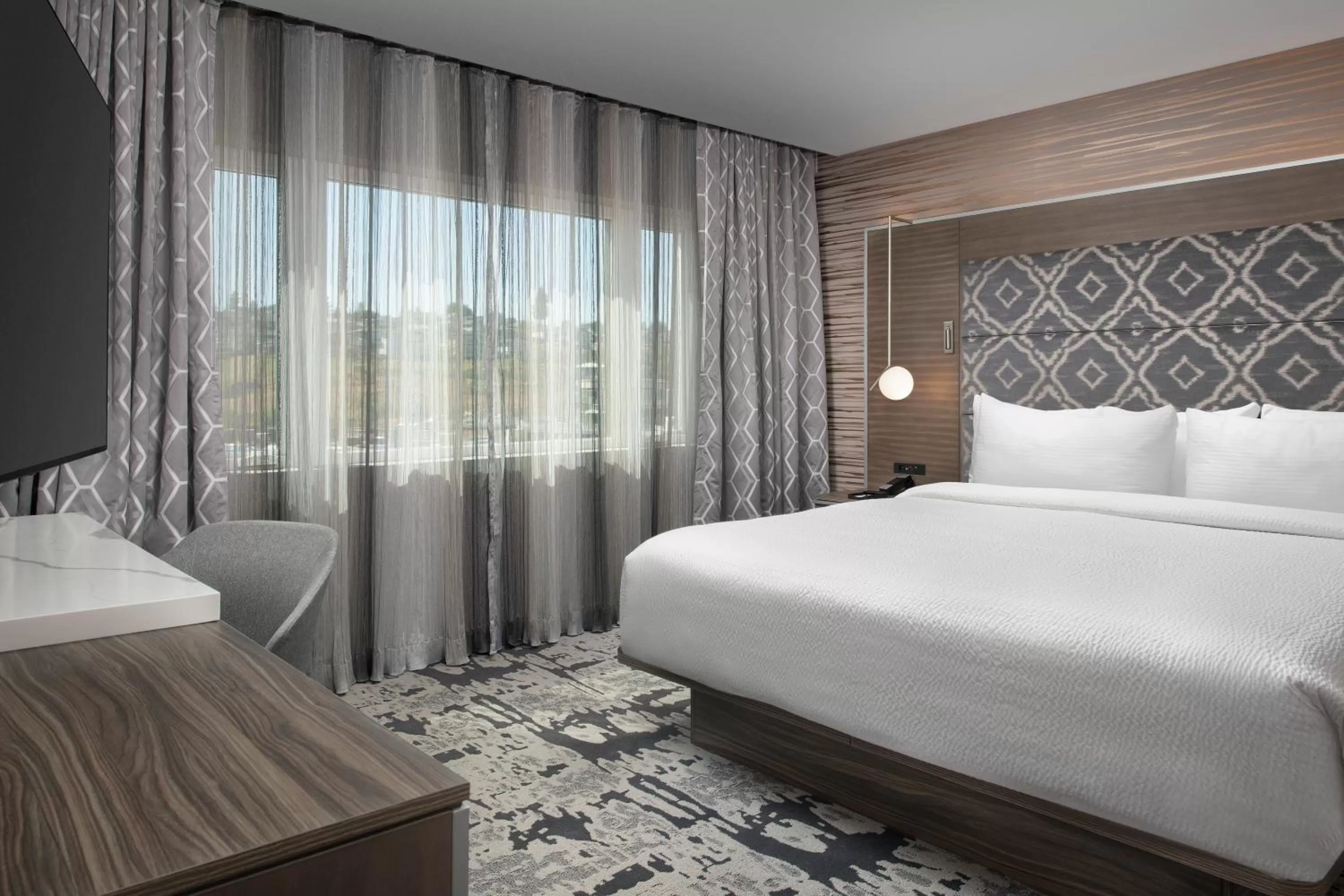 Bed in Silver Cloud Hotel Tacoma at Point Ruston Waterfront