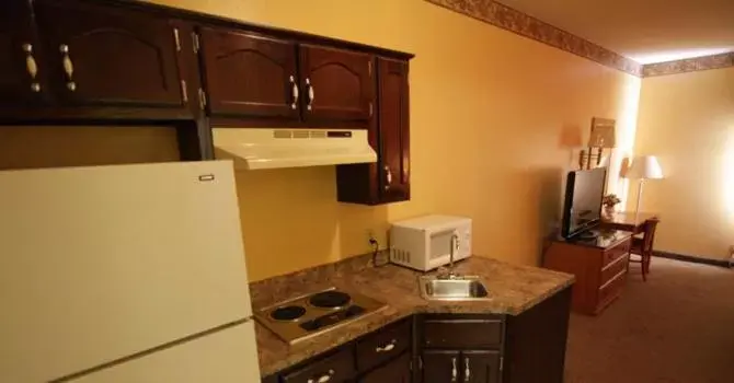 Kitchen or kitchenette, Kitchen/Kitchenette in Magnolia Inn And Suites