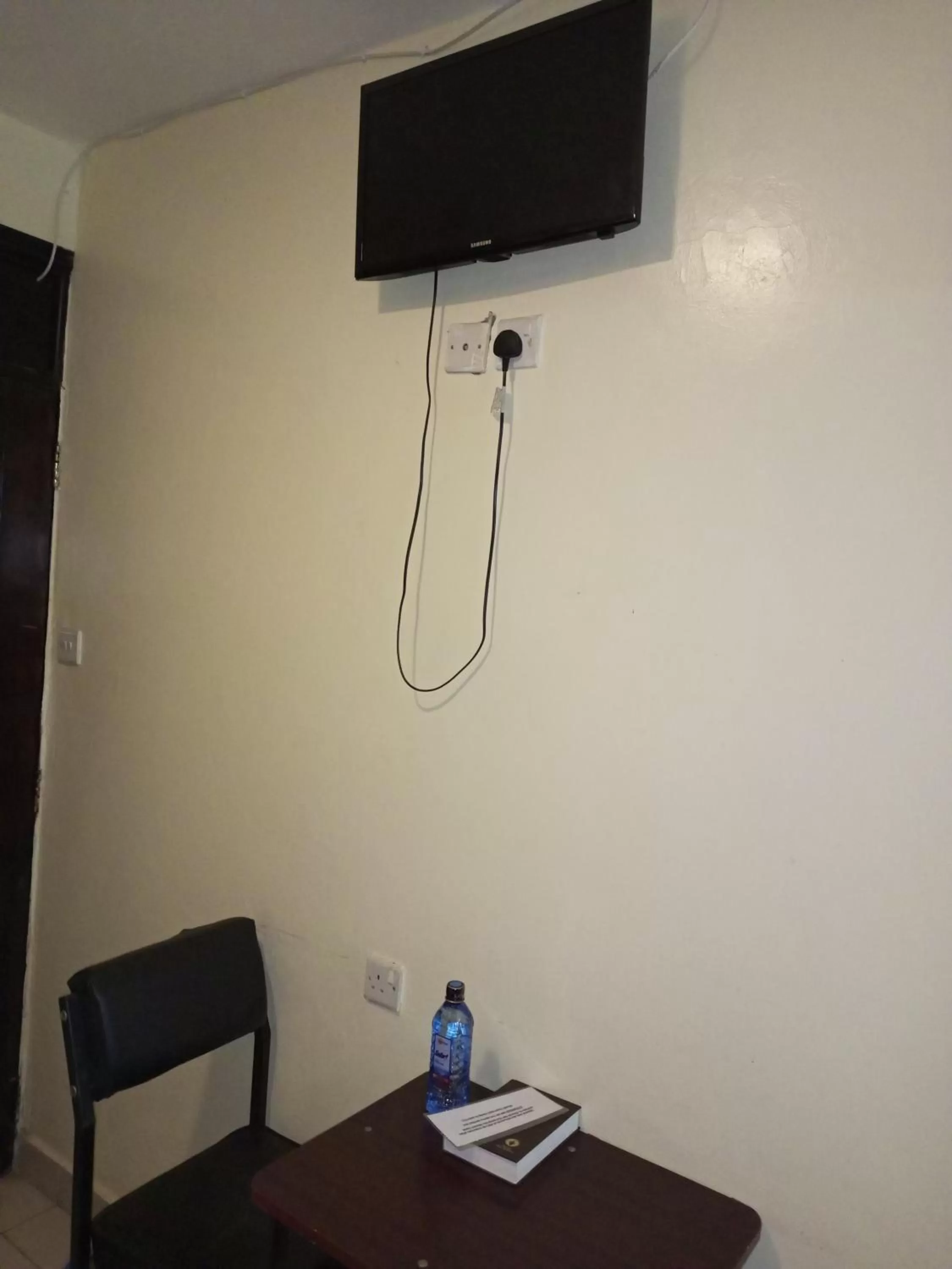 Bedroom, TV/Entertainment Center in Beach View Hotel - Kisumu