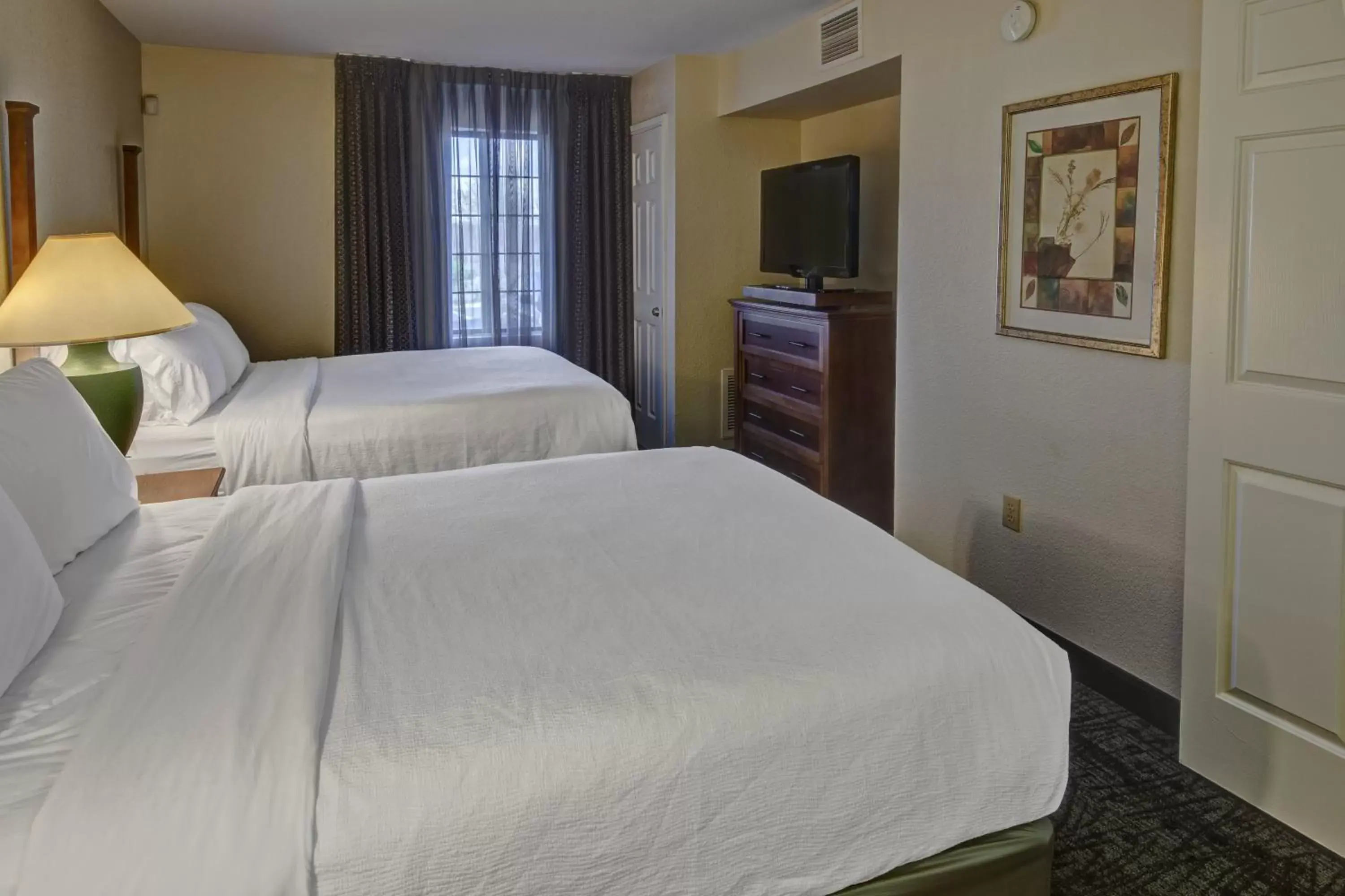 Bed in Staybridge Suites Denver - Cherry Creek, an IHG Hotel