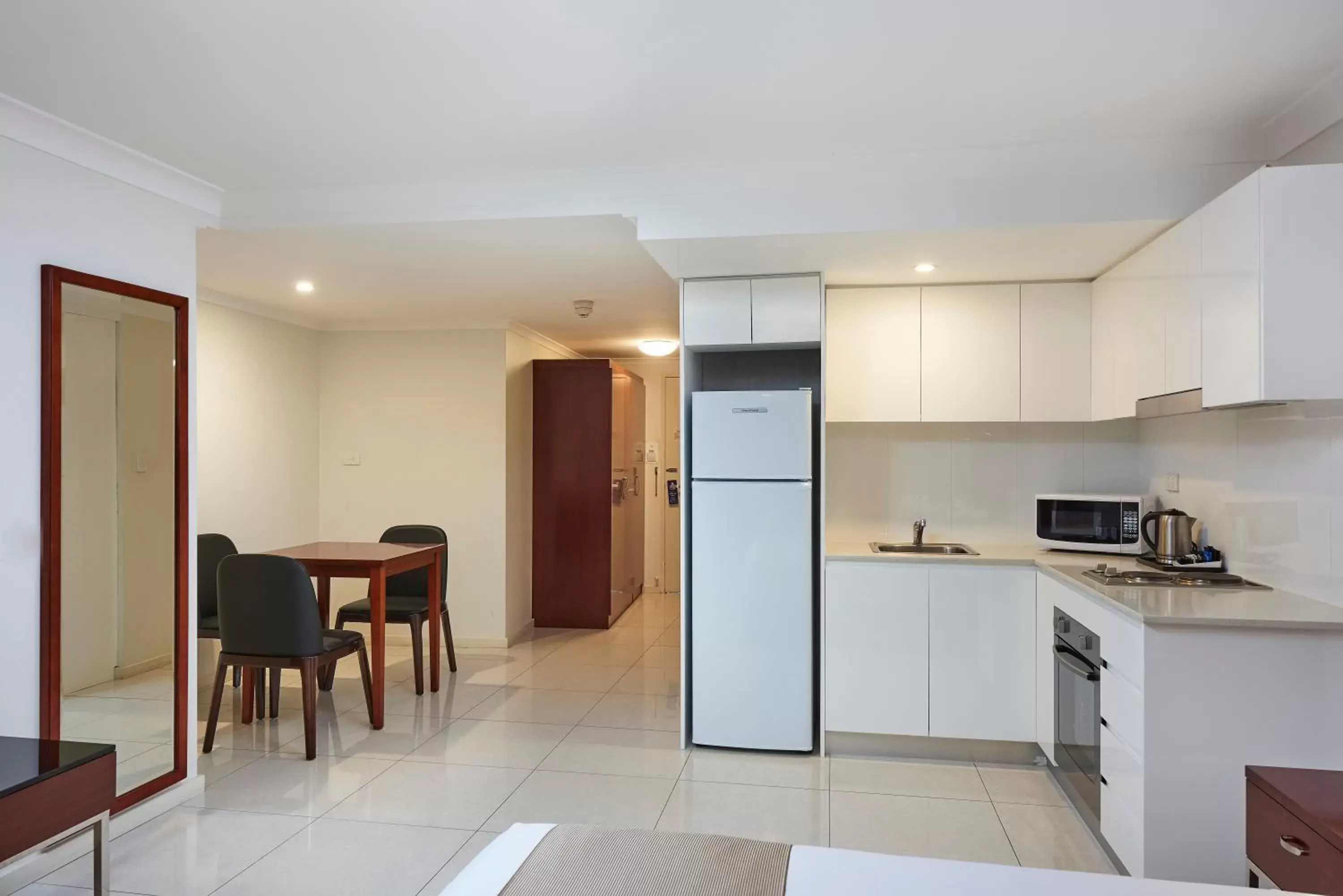 Kitchen or kitchenette, Kitchen/Kitchenette in Best Western Casula Motor Inn