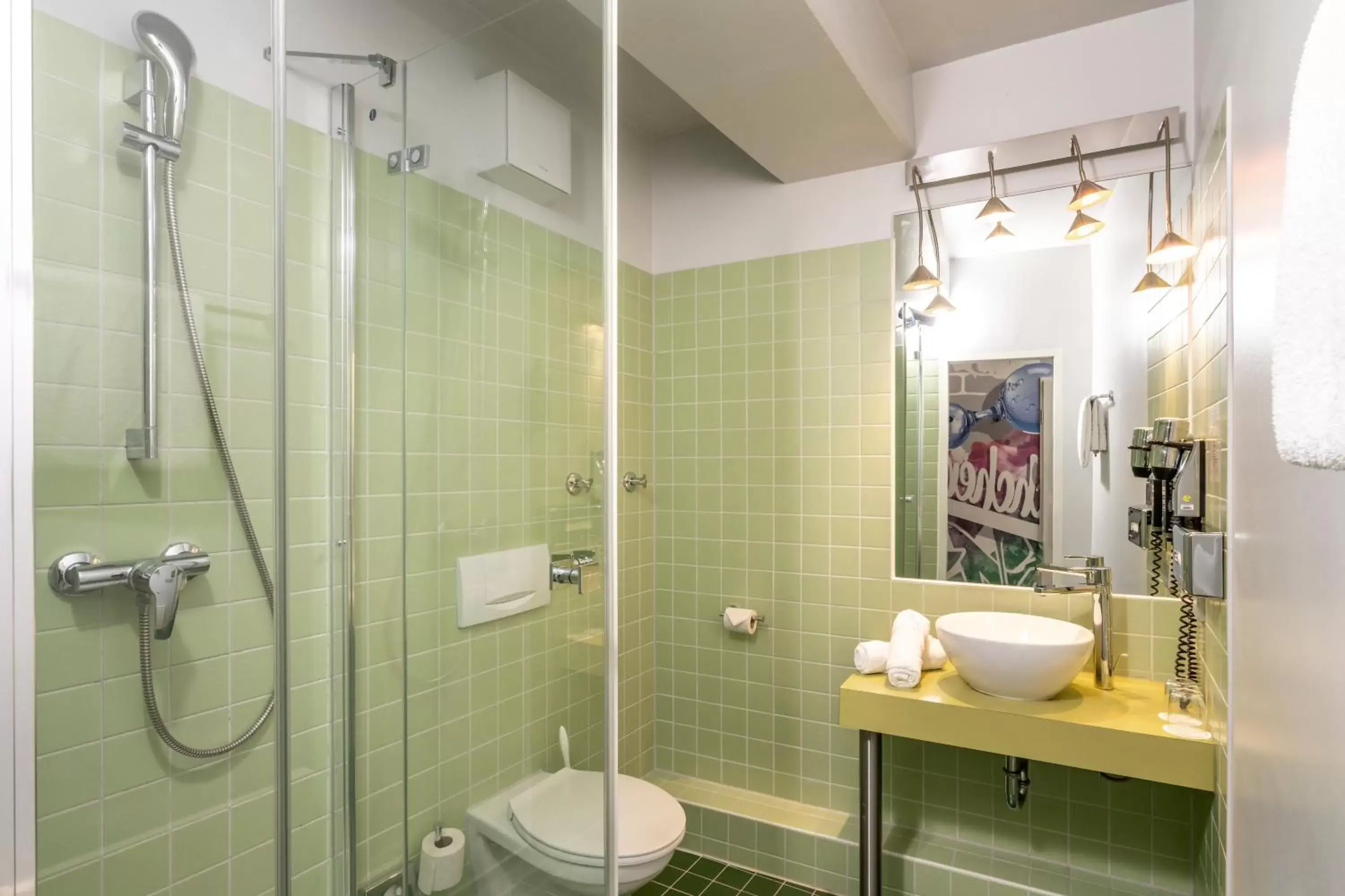 Bathroom in ibis Styles Hamburg Alster City