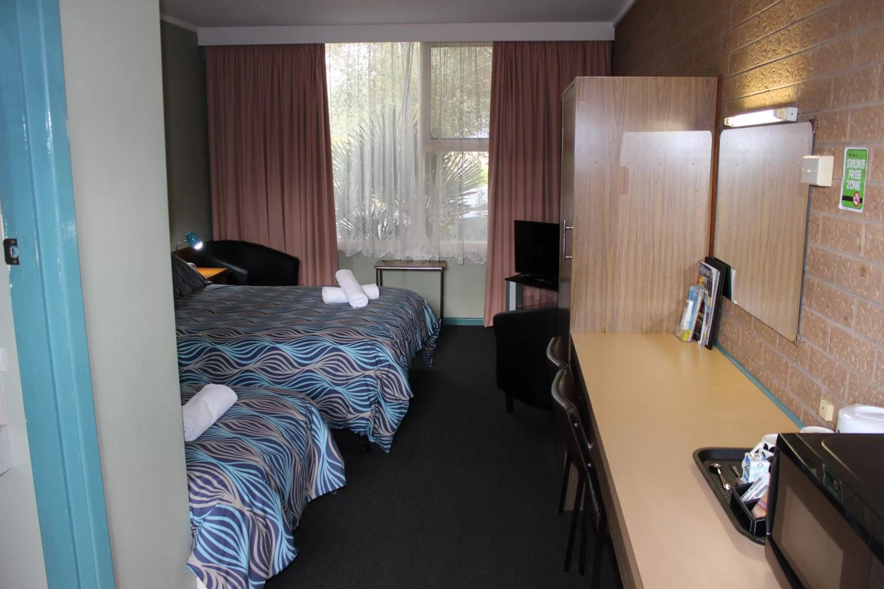 Bed in Portland Retro Motel