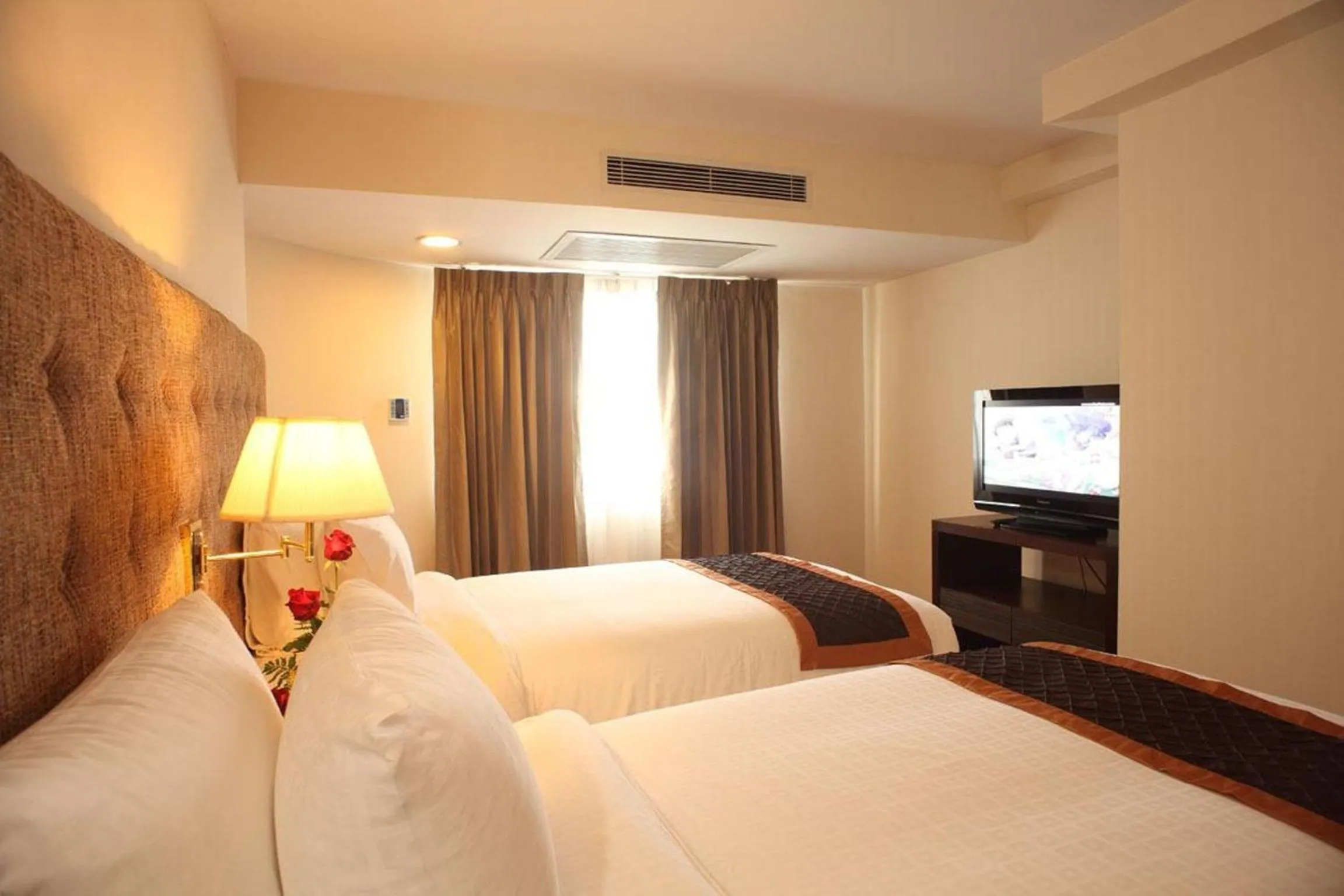 Bed in Furama Chiang Mai