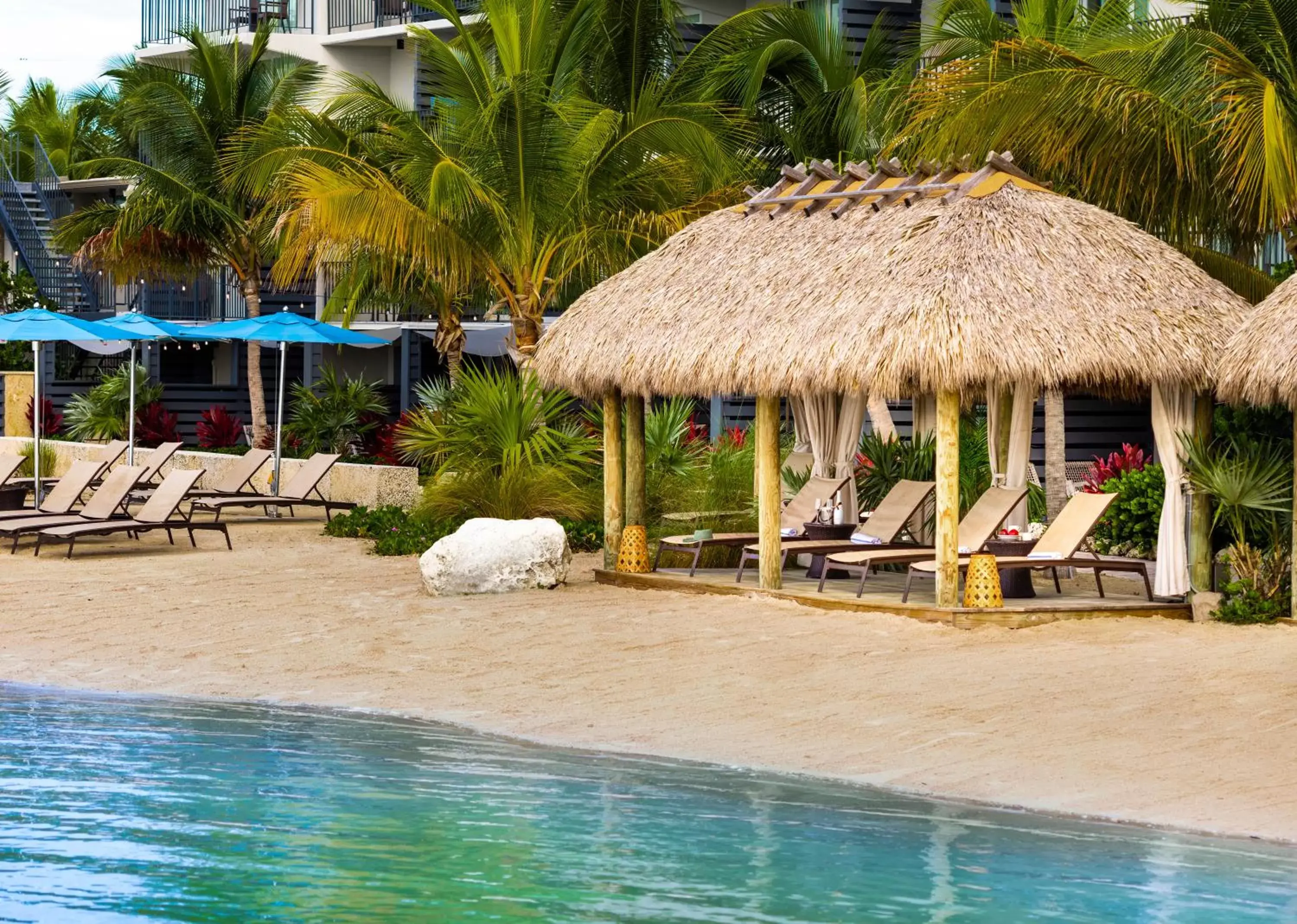 Beach, Swimming Pool in Postcard Inn Beach Resort & Marina