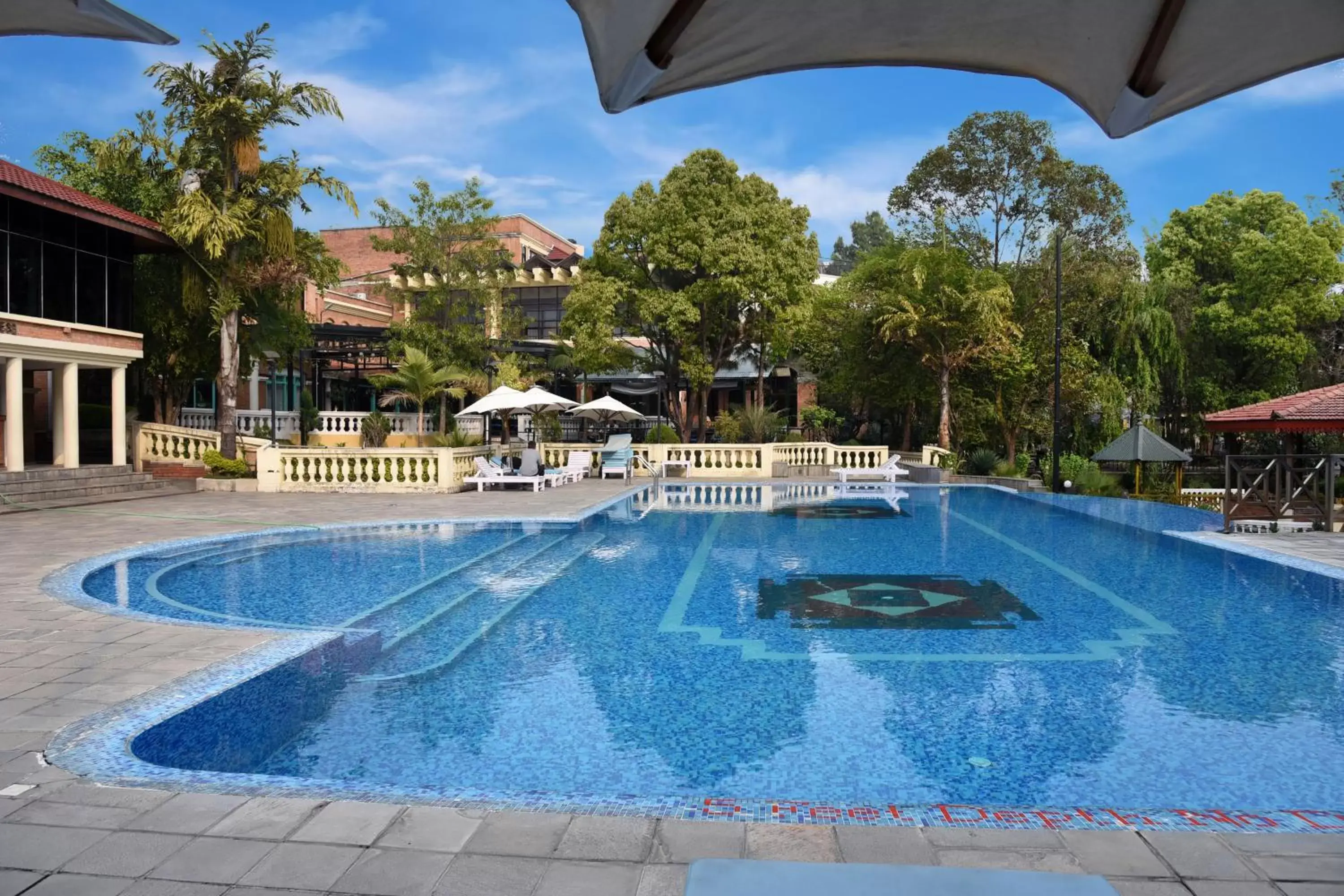 Swimming Pool in Park Village Resort by KGH Group