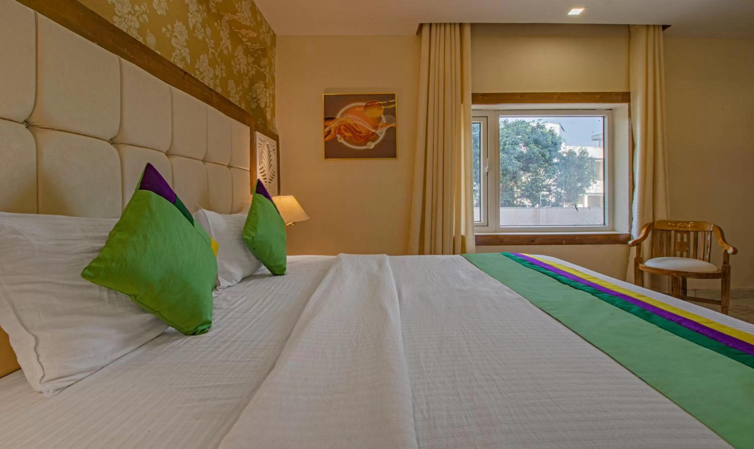 Bed in Treebo Trend Haveli Resort Roots Bhupatwala