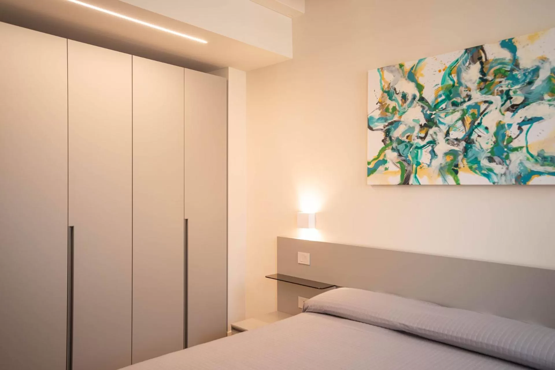 Bed in Maison Calcirelli rooms