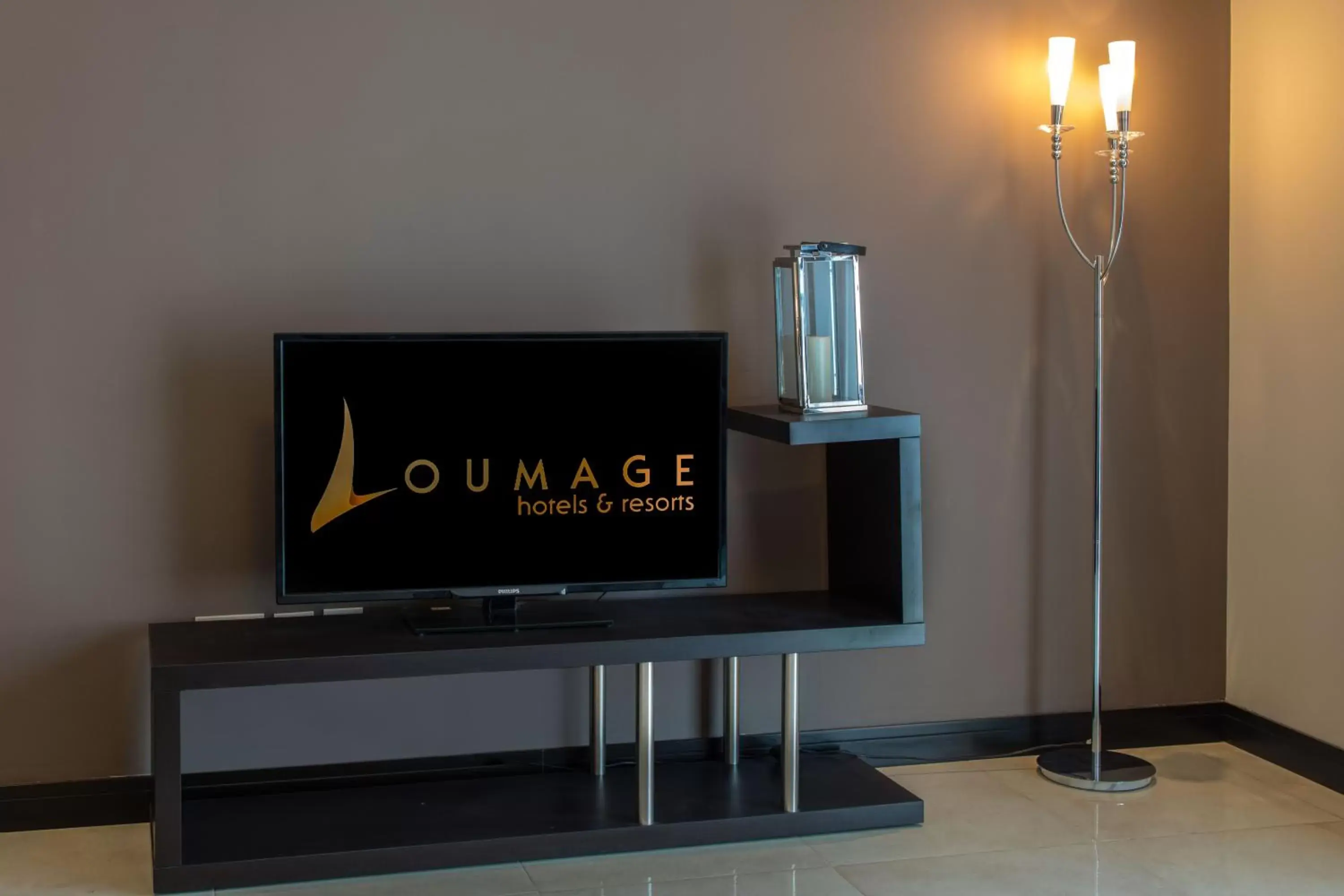 TV and multimedia in Loumage Suites and Spa