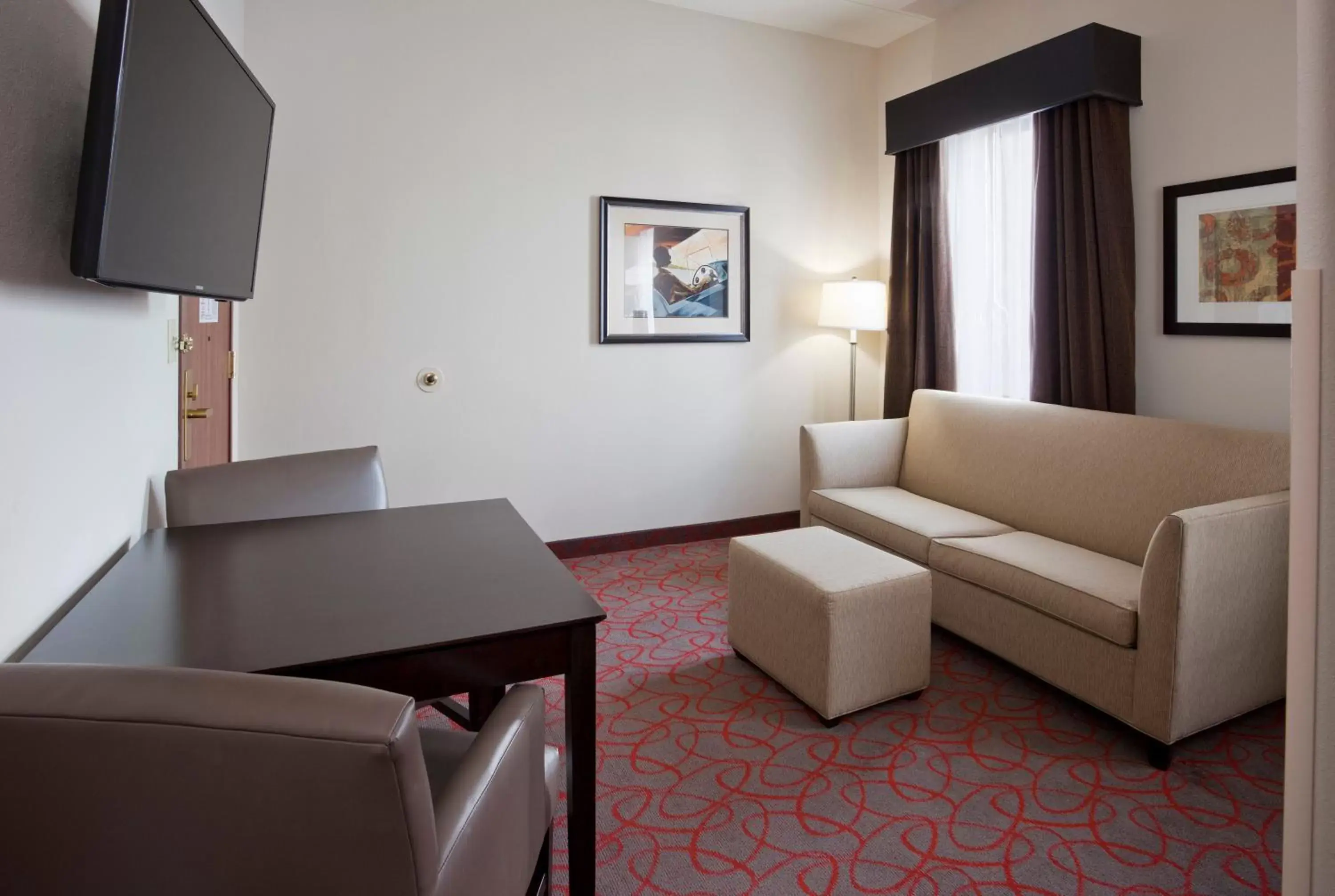 Photo of the whole room, Seating Area in Holiday Inn Express & Suites Bloomington West, an IHG Hotel