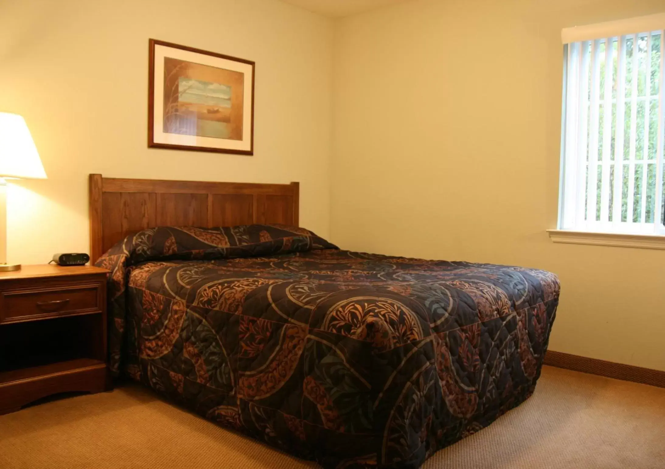 Bed in Affordable Suites Greenville