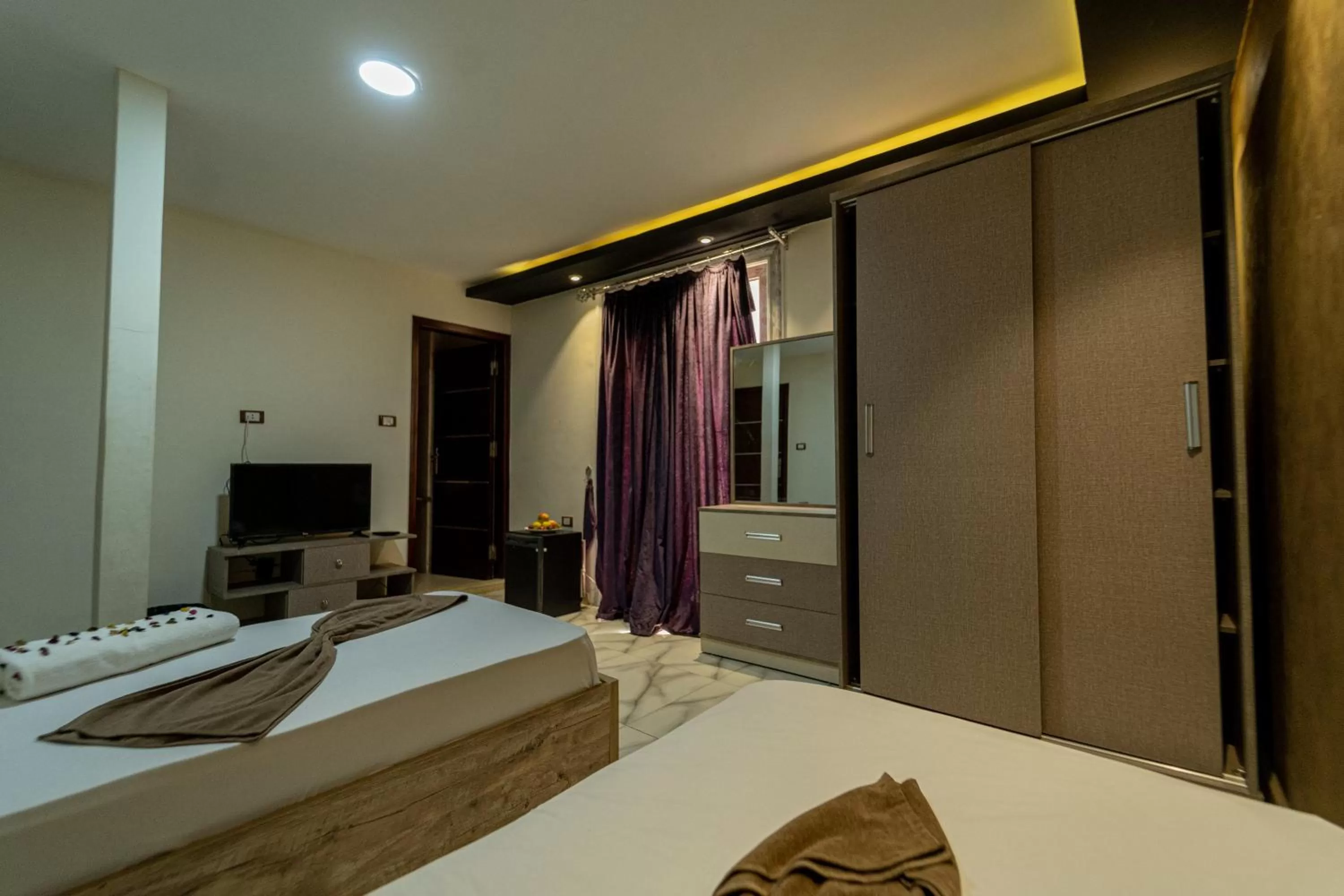 Photo of the whole room, Bed in Gardenia Inn Hotel