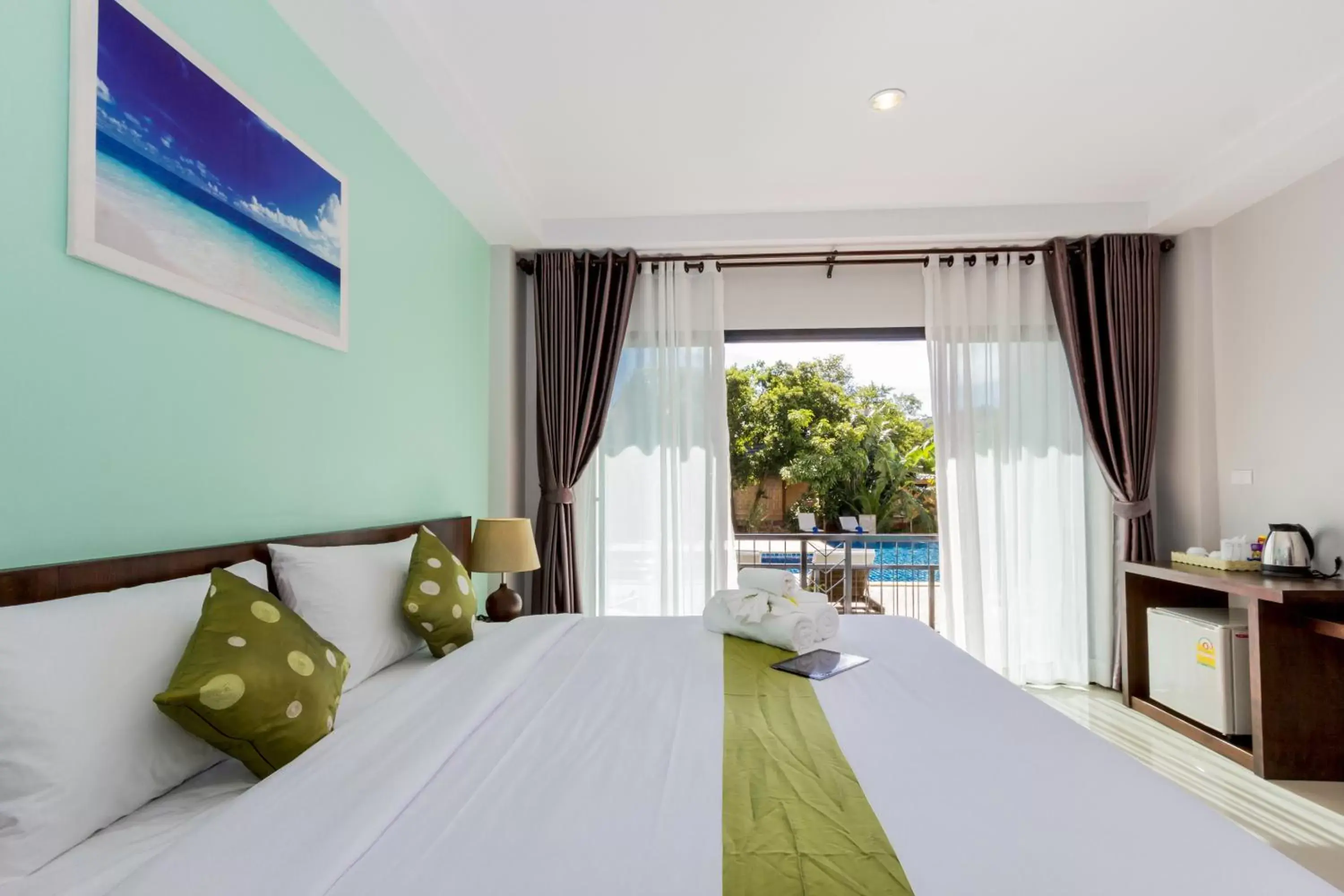 Balcony/Terrace, Bed in Andaman Pearl Resort