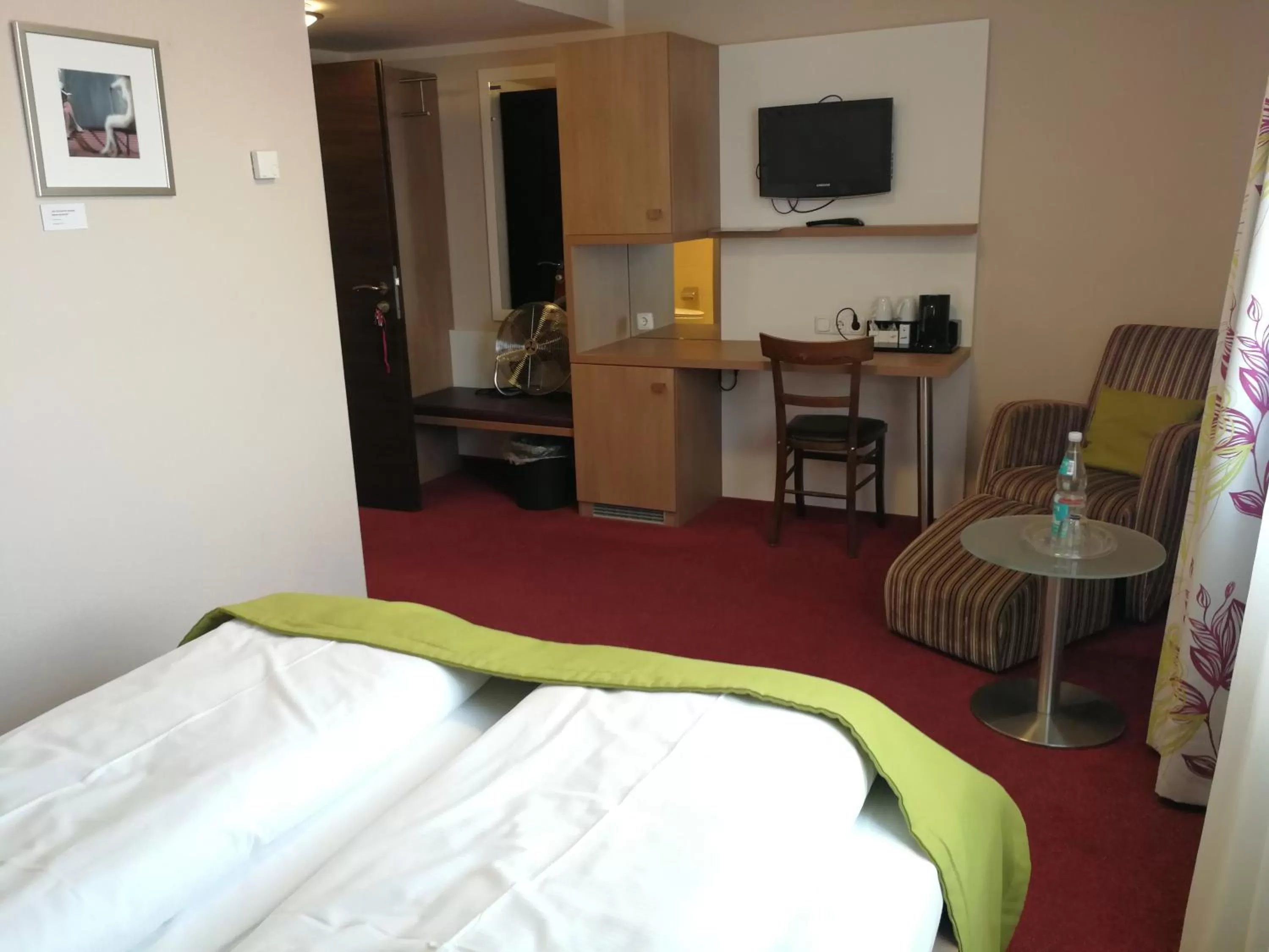 Photo of the whole room, Bed in TRIP INN PostHotel Düren