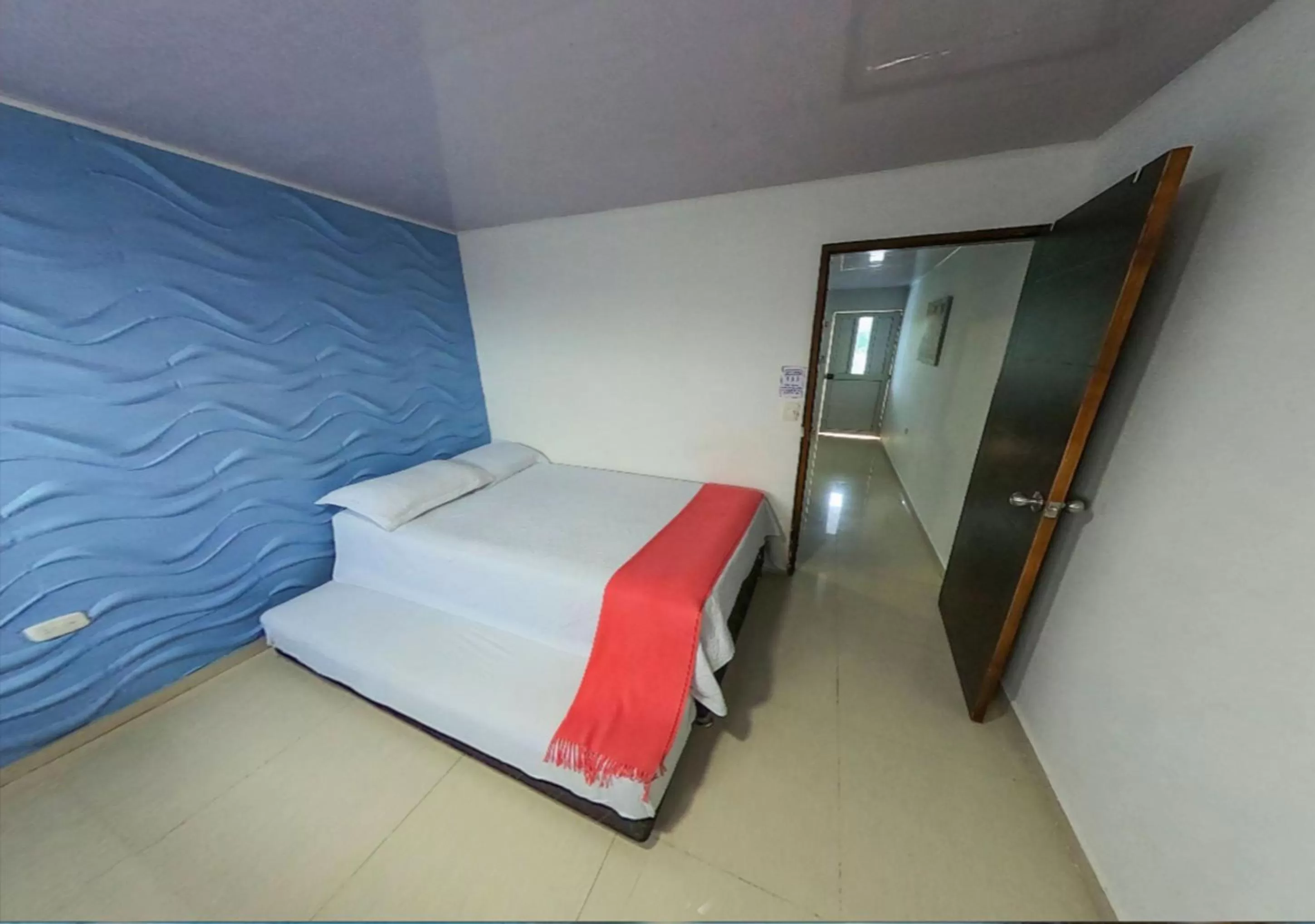 Bed in Apartamentos Isla Tropical