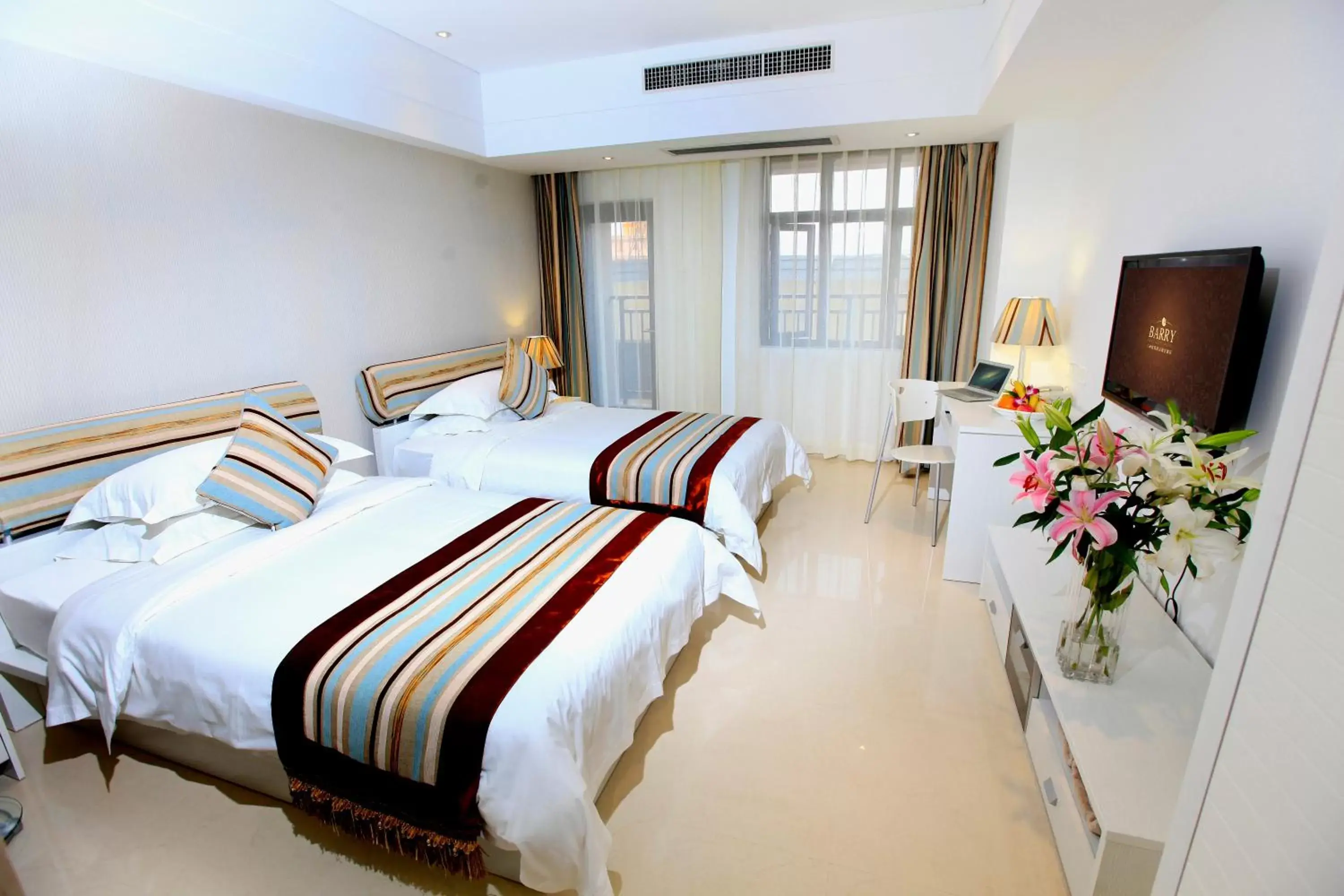 Bed in Barry Boutique Hotel Sanya