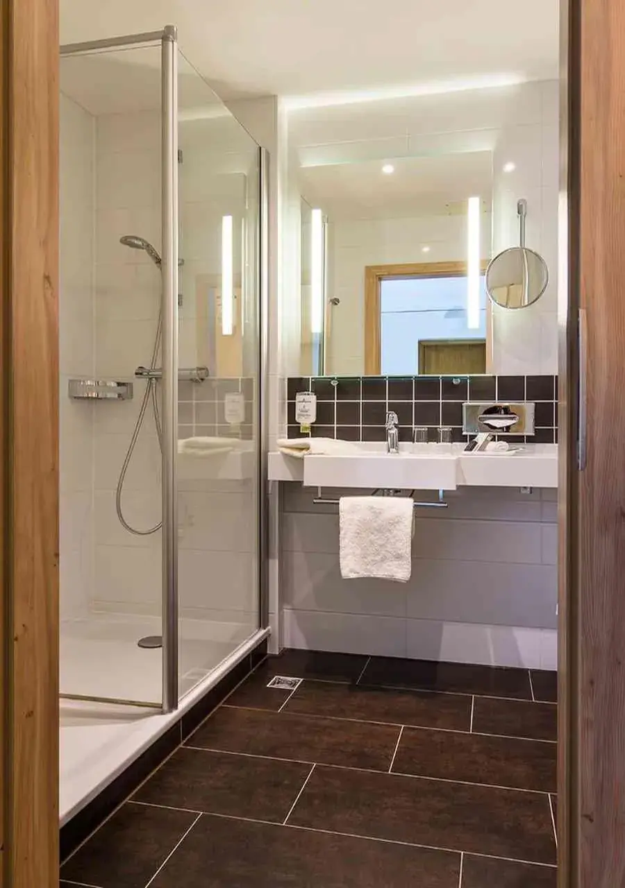 Shower, Bathroom in AMBER HOTEL Bavaria